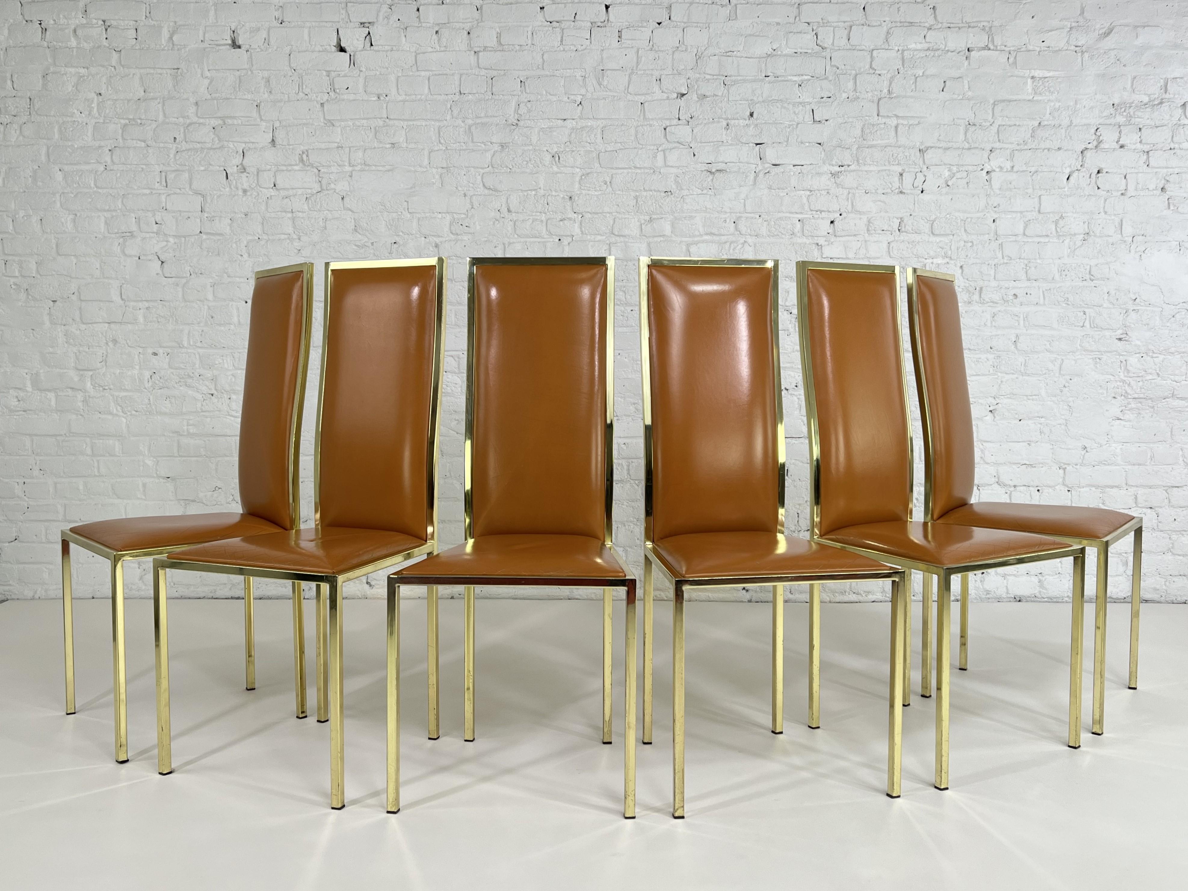 1970s Italian Renato Zevi Design Leather And Brass Set of 6 Chairs composed of a brass structure adorned with cognac leather back and seat. Beautiful patina and comfortable!