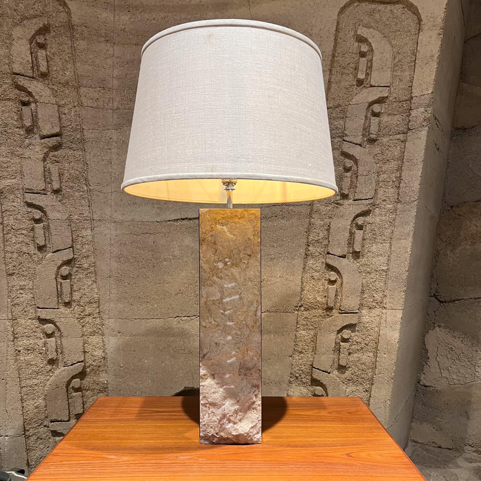 
1970s Italian Table Lamp Raw Edge Travertine and Stainless Steel
Rough Cut Modern Table Lamp Italy
Late 20th Century
Unmarked
24 h to socket x 5.13 d x 7 w
Preowned unrestored vintage condition
No shade is included.
Refer to images provided.