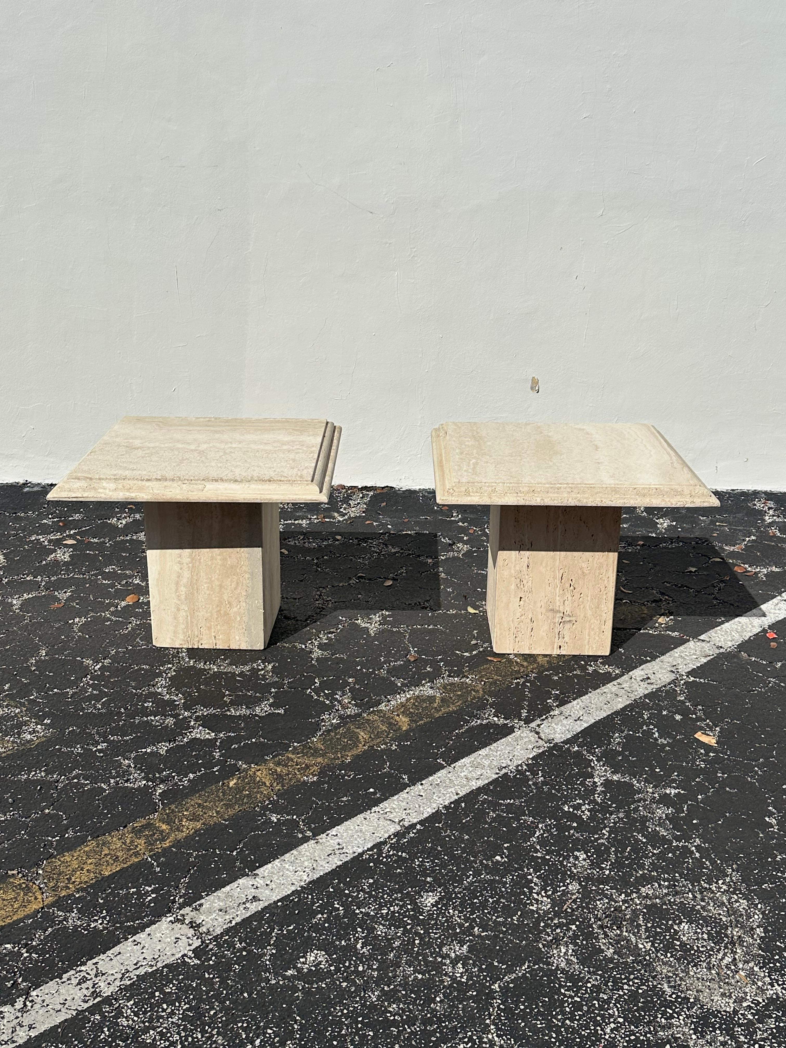 Transport yourself back to the sleek and sophisticated 1970s with this exquisite hand crafted travertine end tables. The ultra rare tables gives an air of culture and refinement. Outstanding design is exhibited throughout. The tables are statement