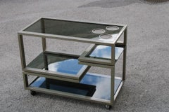 Italienischer Wagen aus gebürstetem Stahl mit minimalistischem und Rationalistischem grauem Glas aus den 1970er Jahren