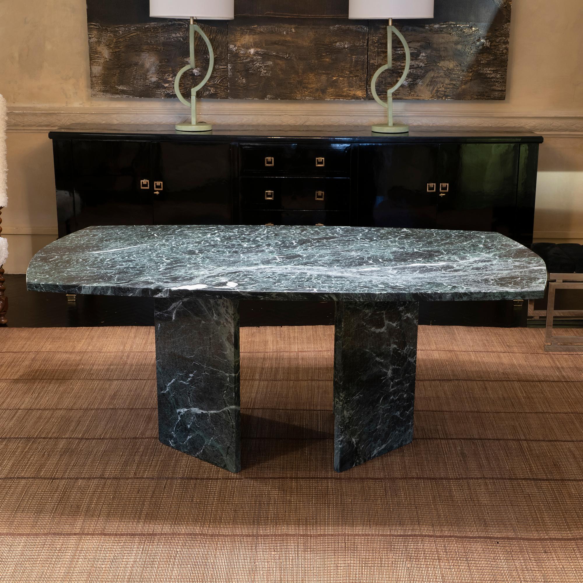 1970s Italian center / Dining table in Verde Alpi marble, top and two detached triangular bases, perfect condition and vintage patina on the surface.