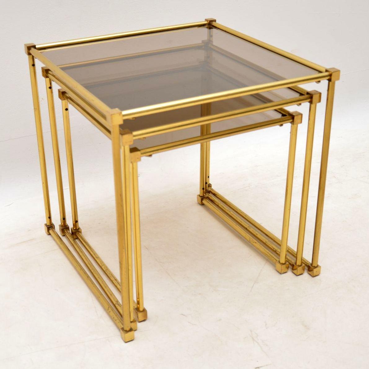 A stylish and extremely well made nest of brass tables, these were made in Italy and they date from around the 1970s. The quality is superb, and they are in excellent condition for their age, with only some extremely minor wear here and