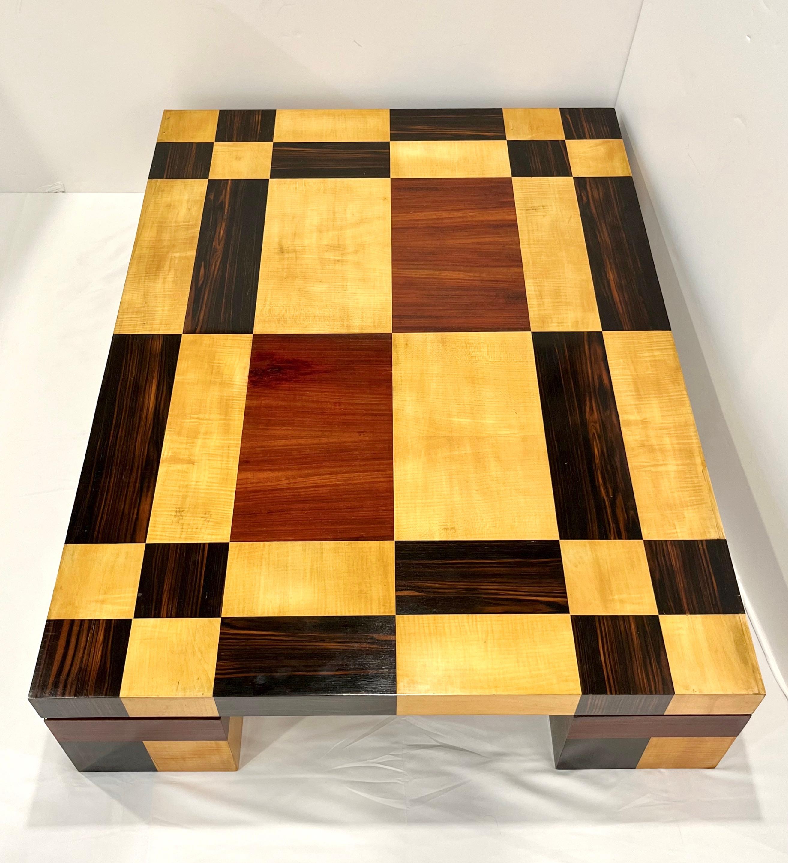 Italian vintage one-of-a-kind piece, from the 1970s, entirely handcrafted in 3 kinds of wood: maple, cherry wood, and walnut, each one cut in different rectangular shapes to create an enticing geometric pattern, a precursor of postmodern style. The