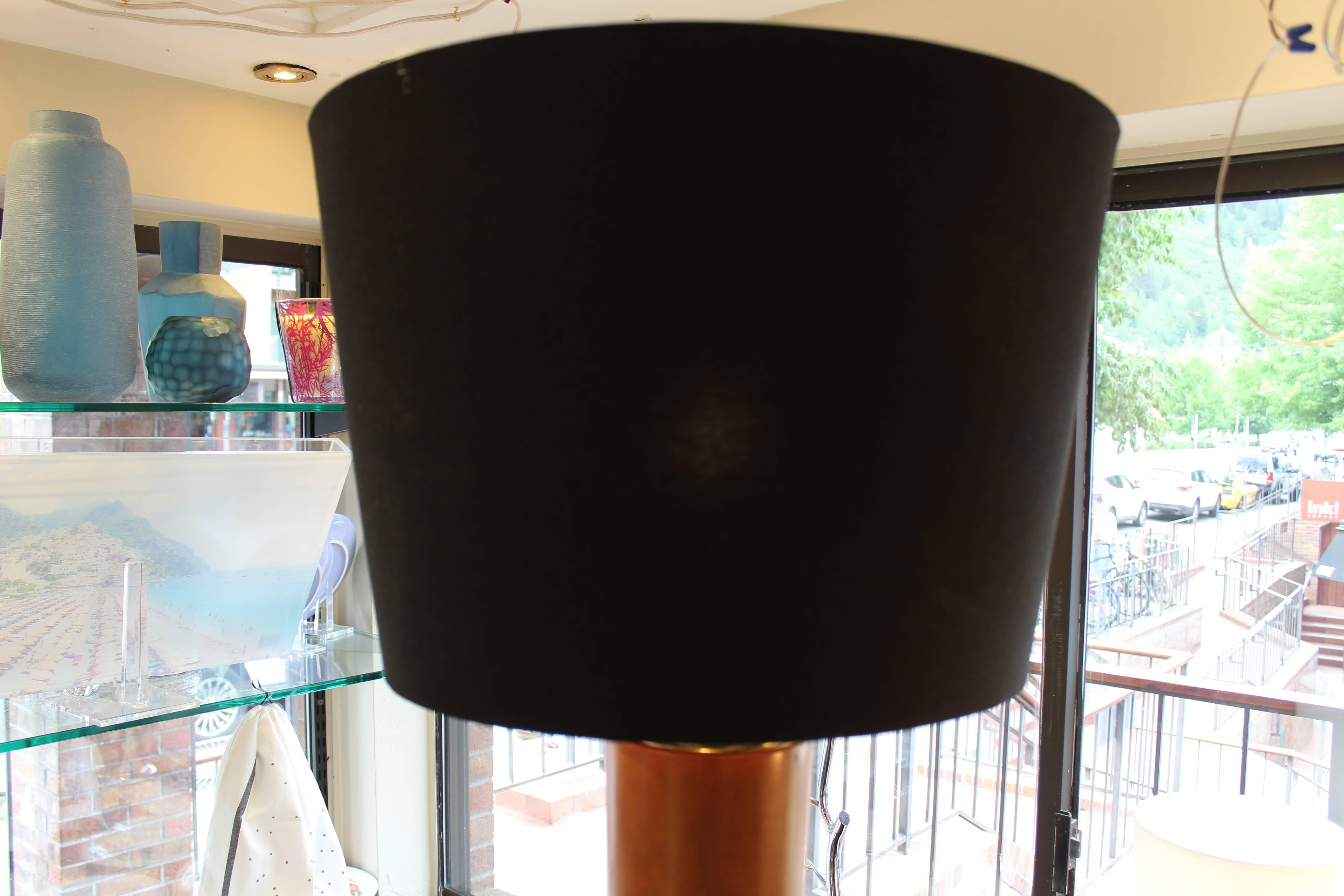 1970's Italian walnut floor lamp with black, asymmetrical lamp shade.

