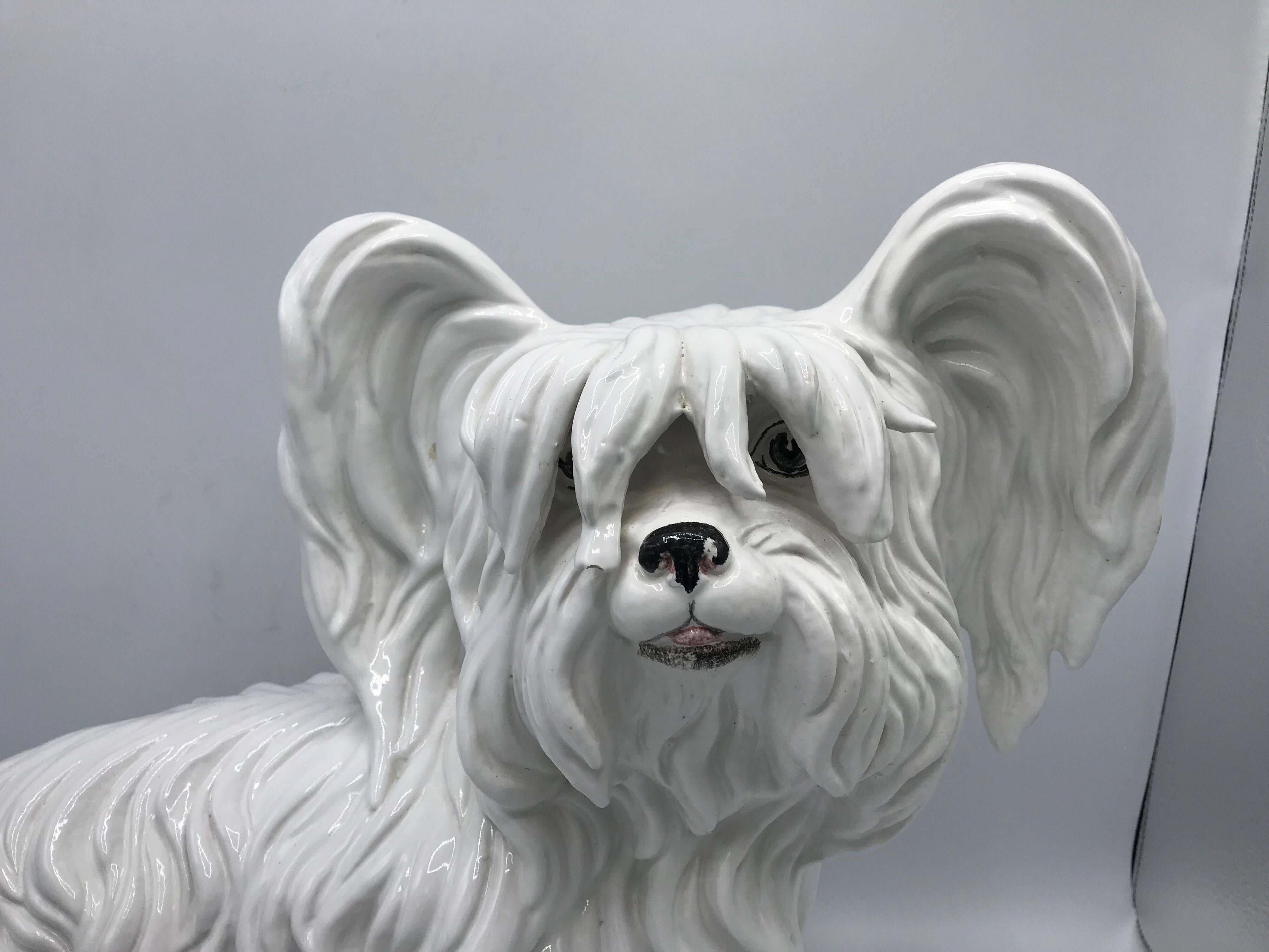 Offered is a fabulous, 1970’s Italian white glazed-ceramic terrier dog sculpture for Mottahedeh. Lovely piece with great detailing. 