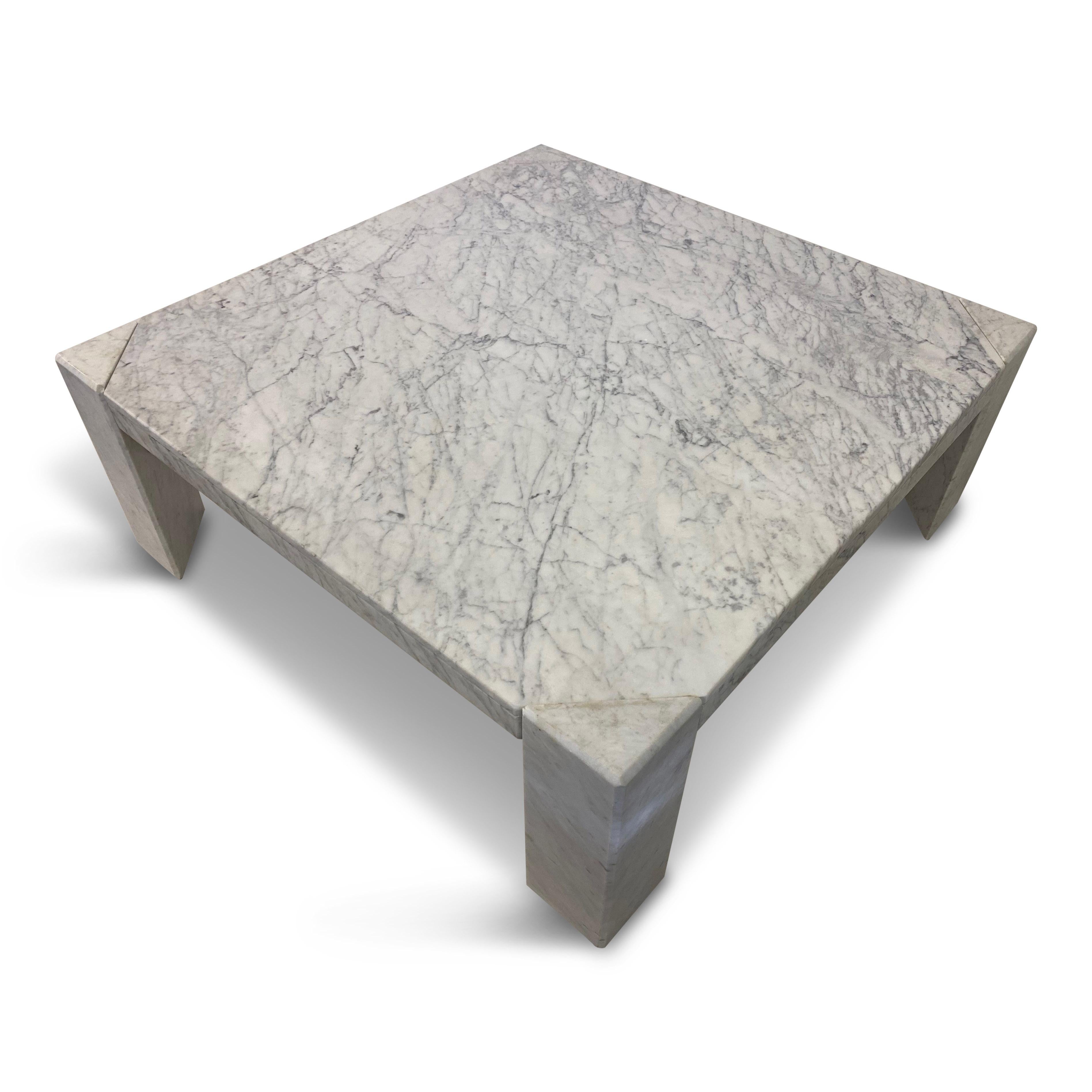 Large coffee table

White marble

Triangular legs

1970s, Italy.
  