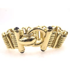 1970s Italian Wide Link 14 Karat Yellow Gold Bracelet Sapphire Accents