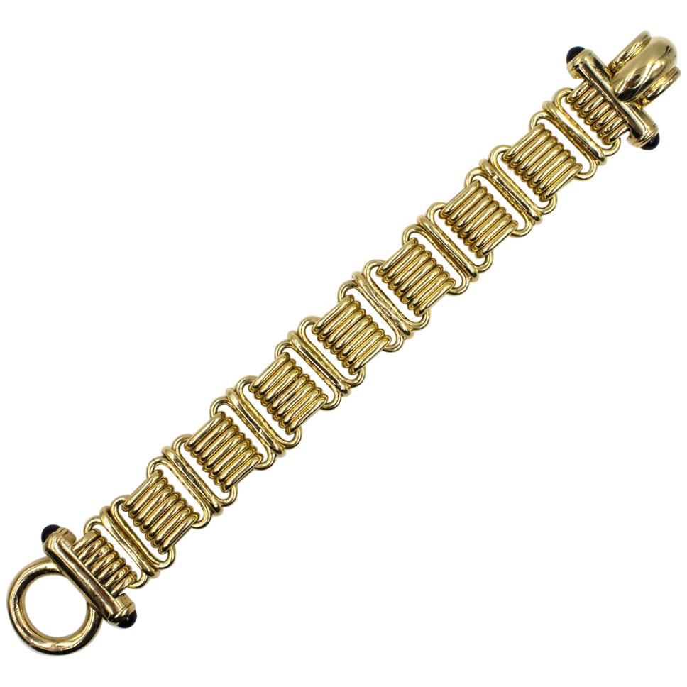 1970s Italian Wide Link 14 Karat Yellow Gold Bracelet Sapphire Accents