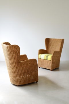 1970's italian wooden shaped armchairs with woven rattan upholstery