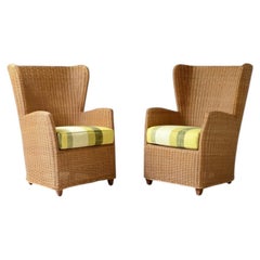 1970's italian wooden shaped armchairs with woven rattan upholstery