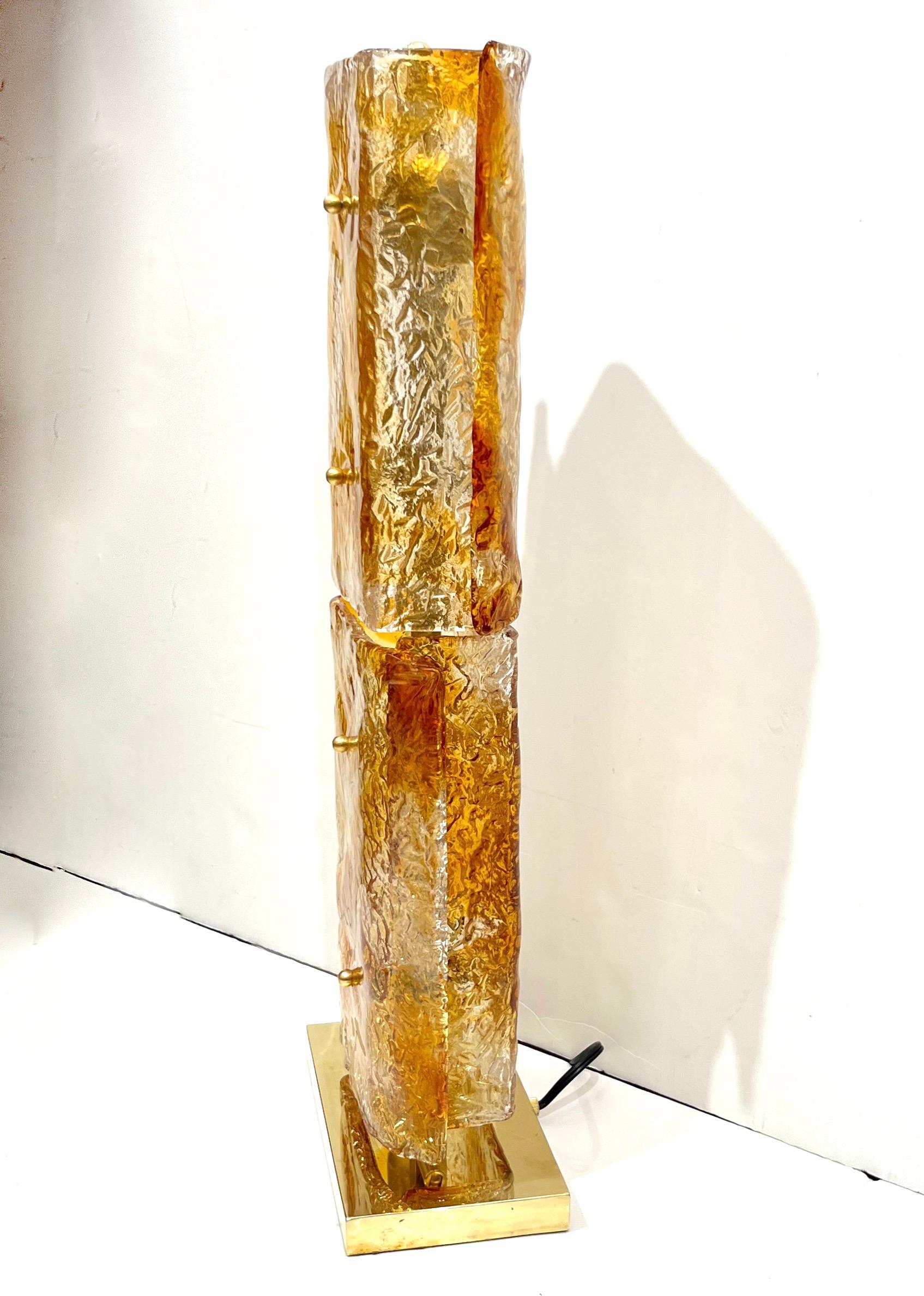 Italian 1970s Italy Sculpture Pair Amber Orange Scroll Pattern Murano Glass Table Lamps For Sale