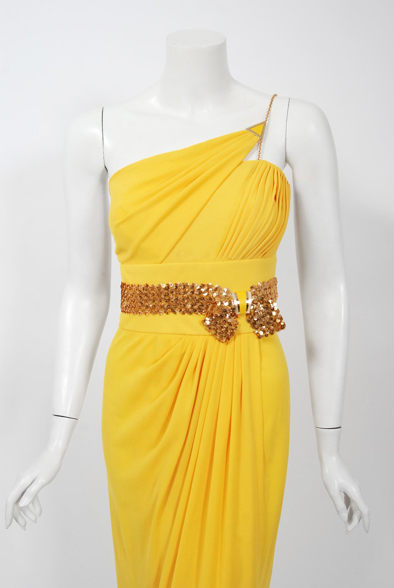A breathtaking and hard to find Jacques Cassia Couture vibrant yellow dress dating back to the late 1970's. Though his work has only recently begun to be appreciated, Lebanese designer Jacques Cassia was a familiar face among fashionable