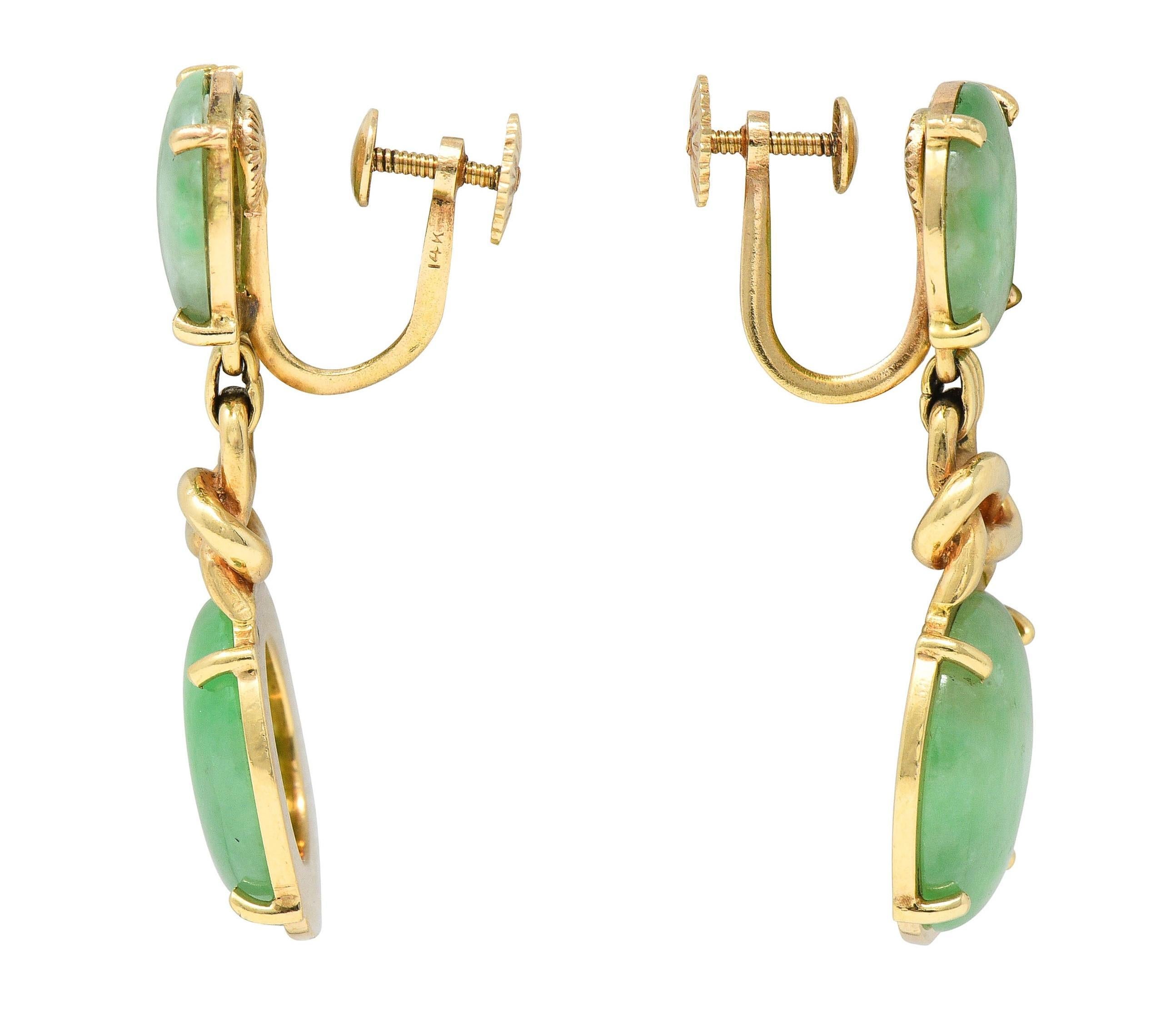 Pendientes de nudo vintage de oro amarillo de 14 quilates con jade de los años 70 Cabujón en venta