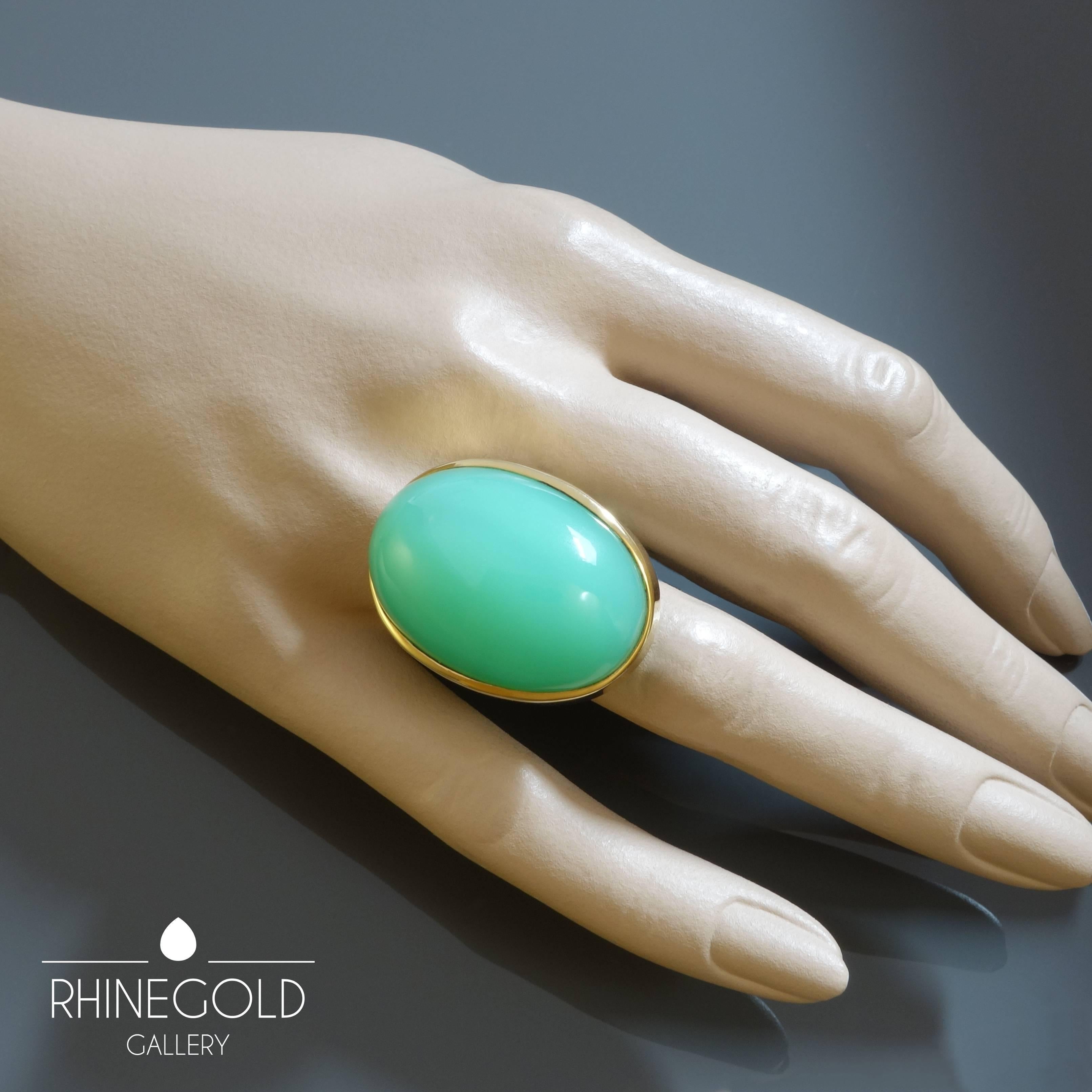 1970s Jade Green 48.5 Carat Chrysoprase Gold Cocktail Ring
18k yellow gold, chrysoprase cabochon (approx. 48.58 carats; estimated in its setting)
Ring head 3.1 cm by 2.3 cm (approx. 1 1/4” by 7/8”)
Ring size: Ø 16.9 mm = EU 53.1 / US 6 1/2 / ASIA