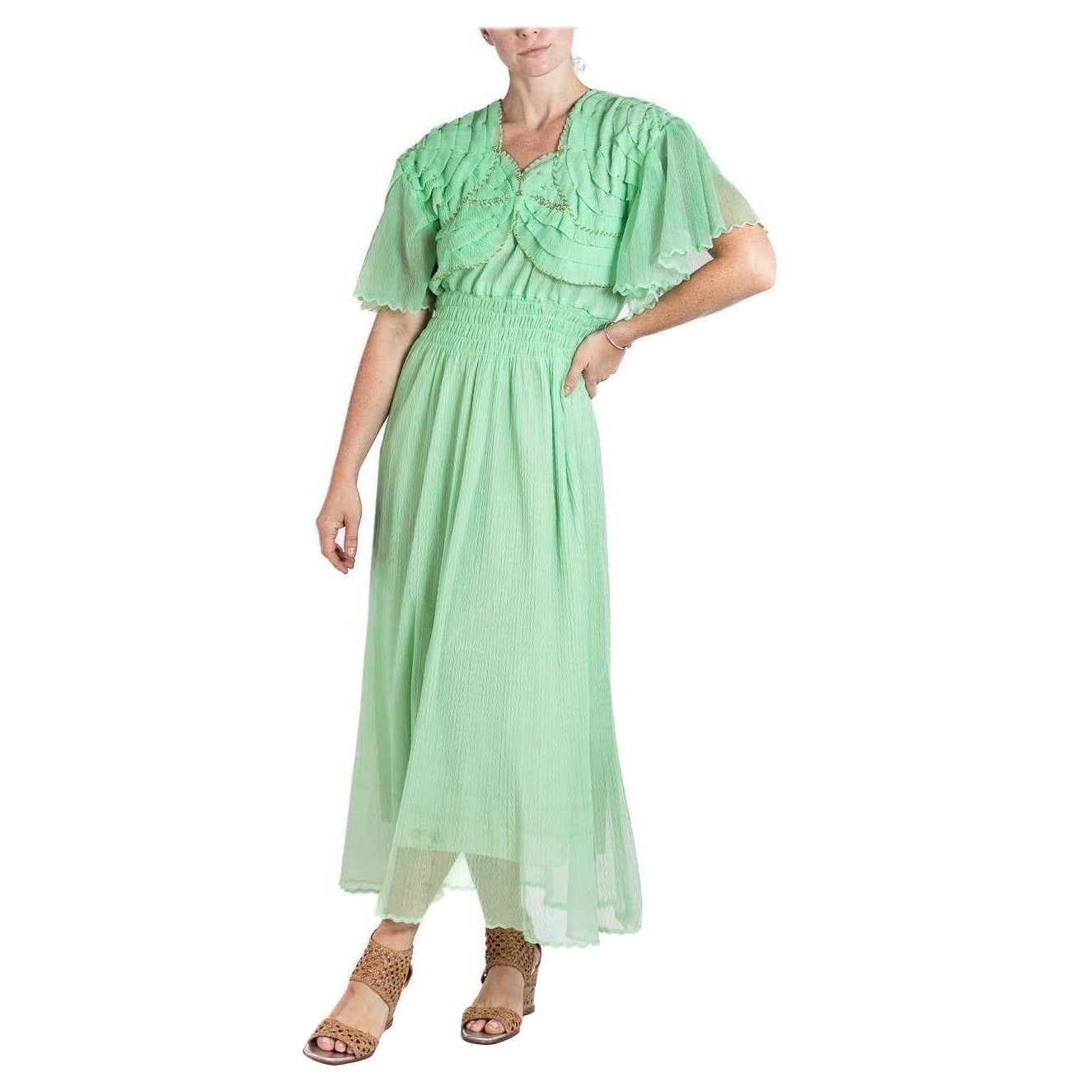Abito in poli/nylon verde giada degli anni '70 con corpetto di perline dettagliato Couture