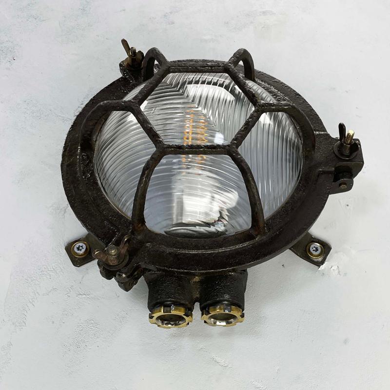 Late 20th Century 1970's Japanese Black Cast Iron Circular Wall Light Hexagon Cage & Reeded Glass For Sale