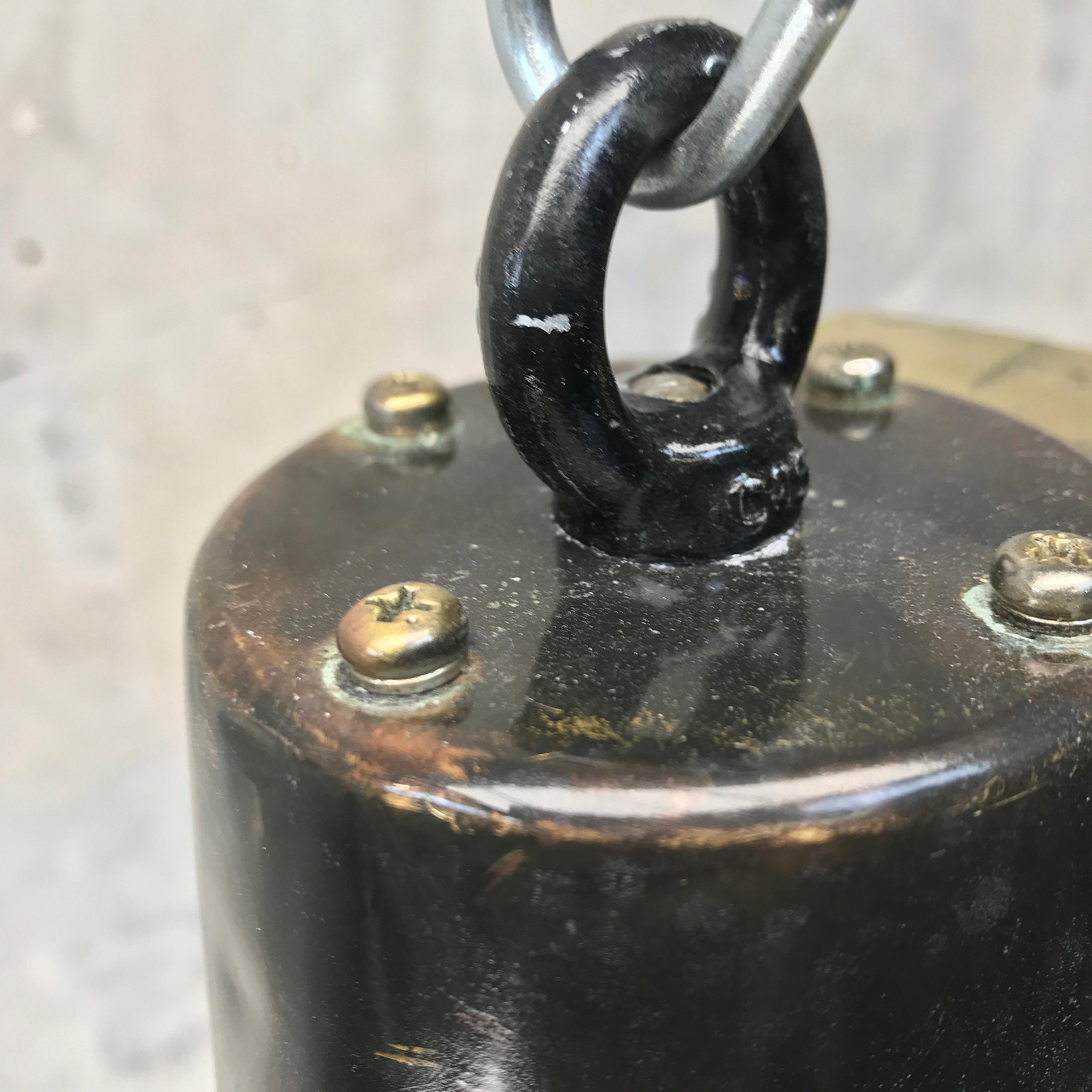 This compact fitting was salvaged from an old Japanese cargo ship built during the 1970s.

We have expertly converted the search light to be a pendant for down lighting areas such as breakfast islands, bar tops, dining tables, snooker tables