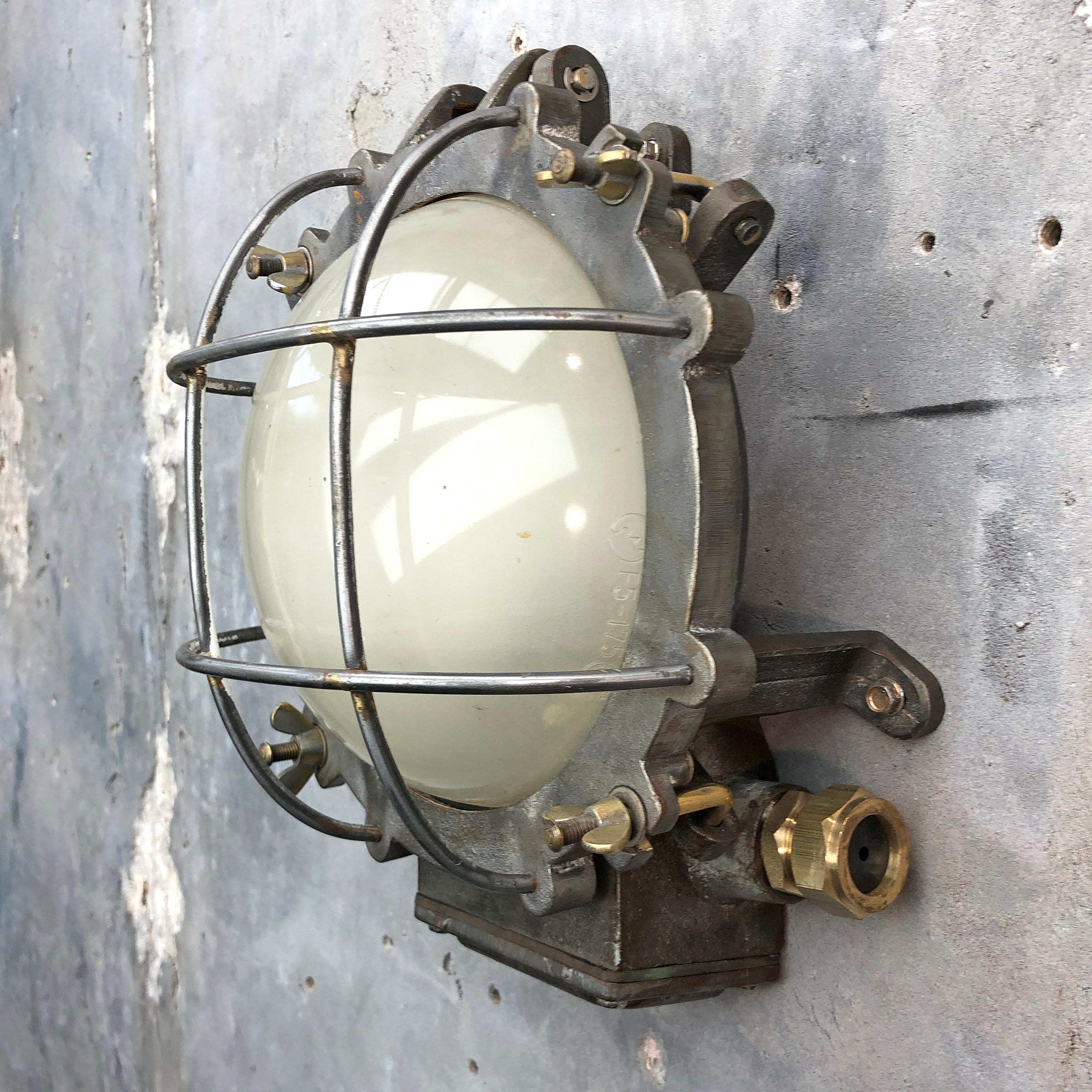 1970s Japanese Cast Iron Wall Light, White Glass Dome, Cage and Brass Fittings In Good Condition In Leicester, Leicestershire