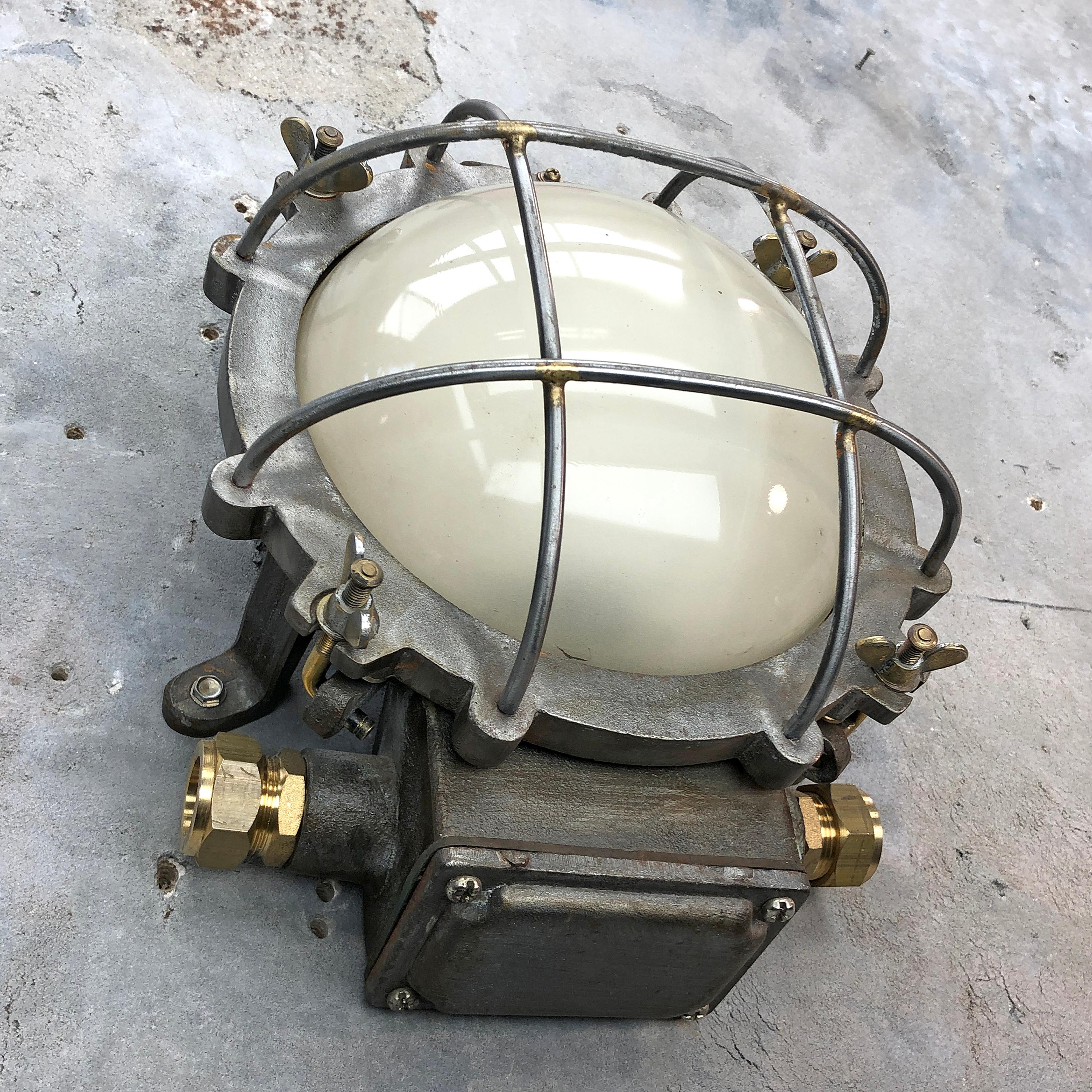 Late 20th Century 1970s Japanese Cast Iron Wall Light, White Glass Dome, Cage and Brass Fittings