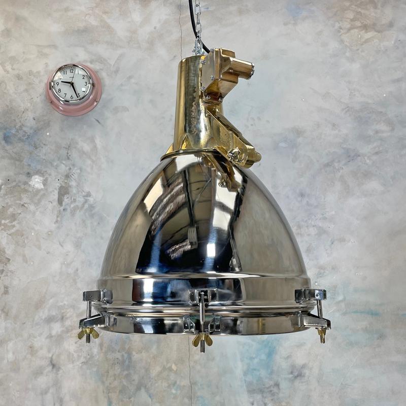Extra large stainless steel searchlight ceiling lights. Originally a marine searchlight converted into ceiling pendant light fixtures.

Originally manufactured in Japan c1970 professionally restored by hand in UK by Loomlight to modern lighting