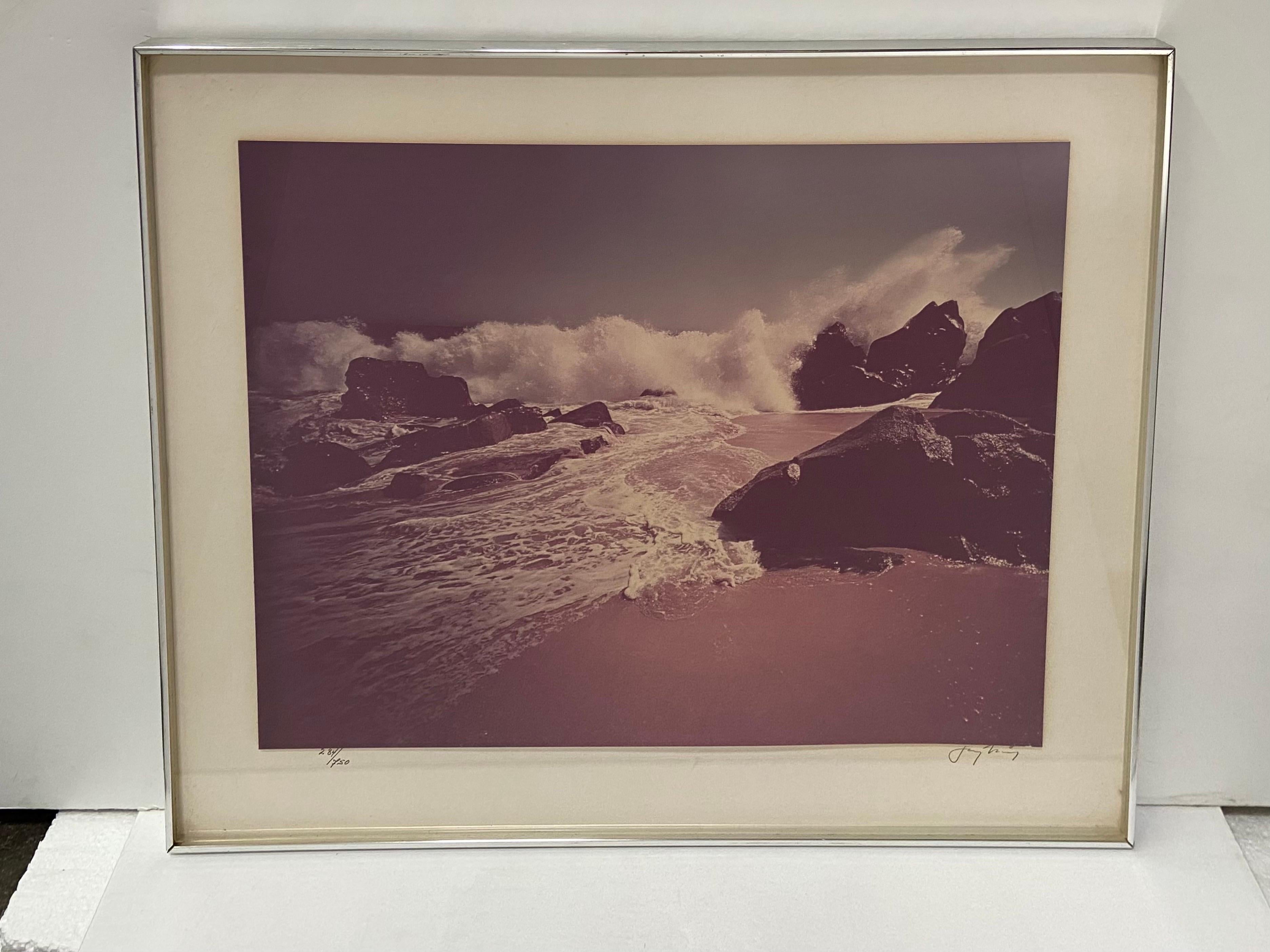 A vintage circa 1970s beach scene photograph by New York City photographer Jay Maisel (Born 1931). This photograph has a period frame dating to the 1970s and retains the original information verso. This work is signed in the lower right corner of
