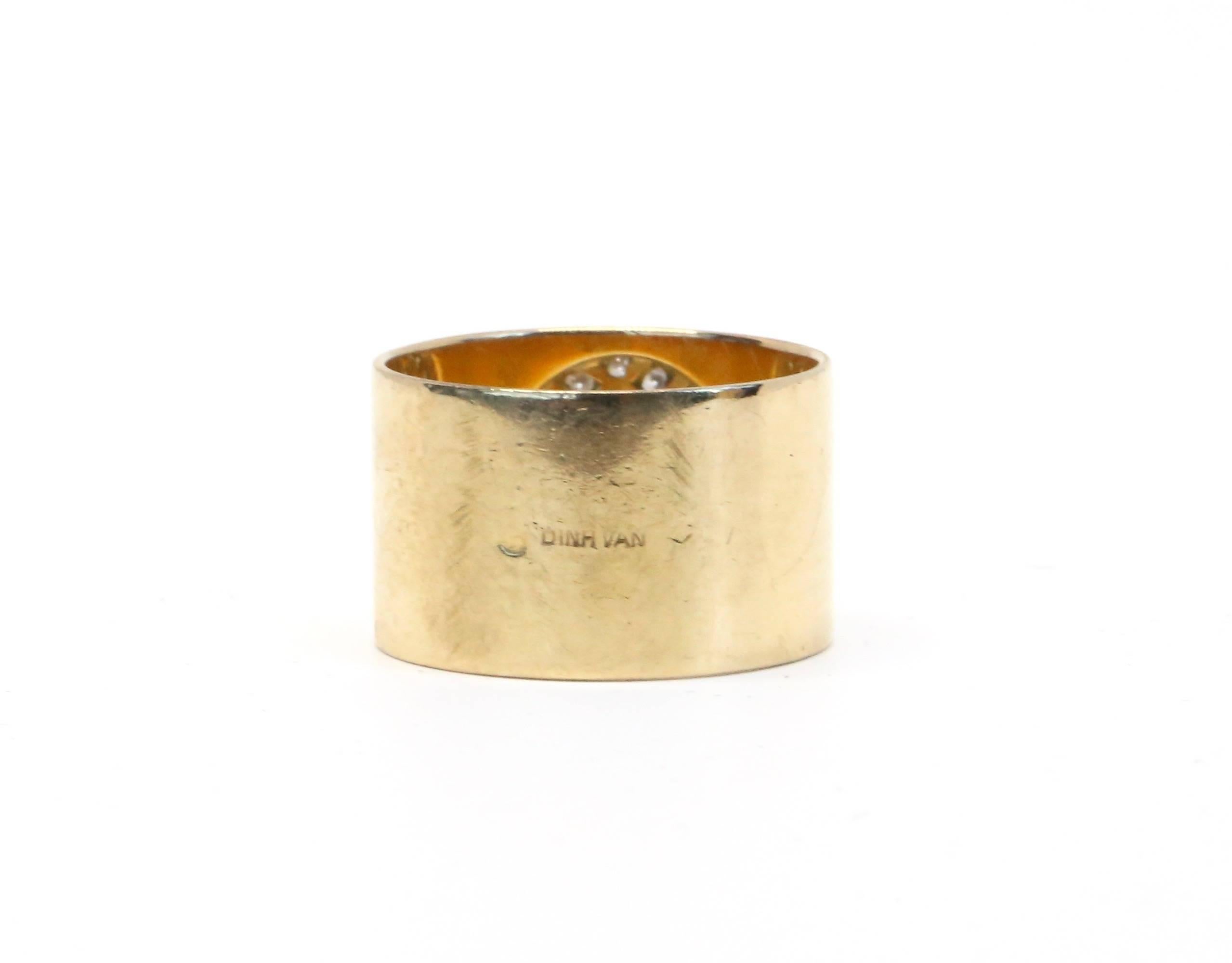 Very early example of the' Anthéa' ring in 18k yellow gold with 23 diamonds designed by Jean Dinh Van dating to the 1970's. Center of ring falls at an American size 7 however due to the thickness of the band (11mm), this ring best fits a size 5.75