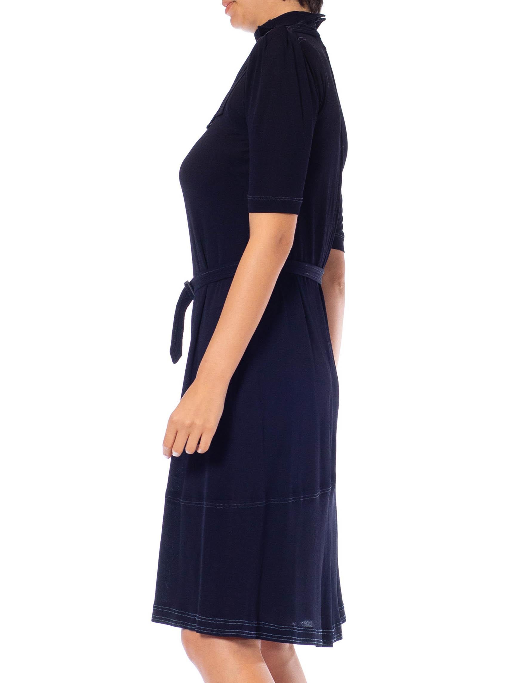 For Saks Fifth Avenue, some holes in the jersey and priced as-is 1970S JEAN MUIR Navy Blue Silk Jersey Dress With Belt 