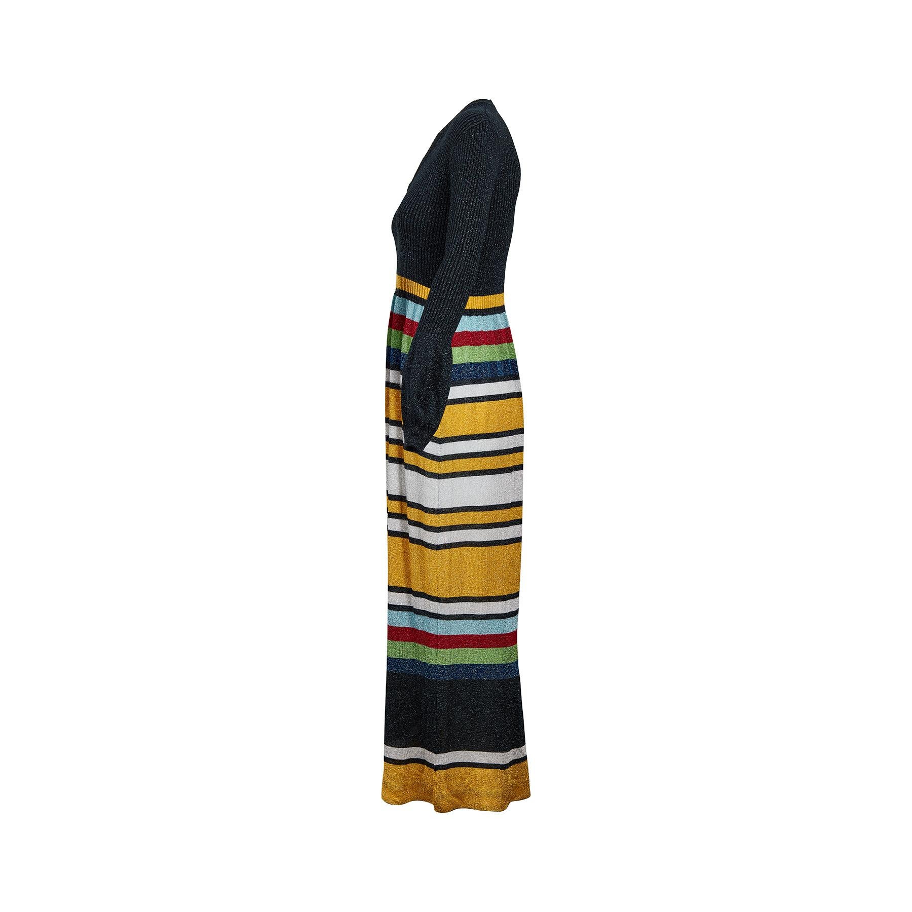 Dies ist ein wirklich auffälliges Kleid aus den späten 60er, frühen 70er Jahren und trägt das Label 