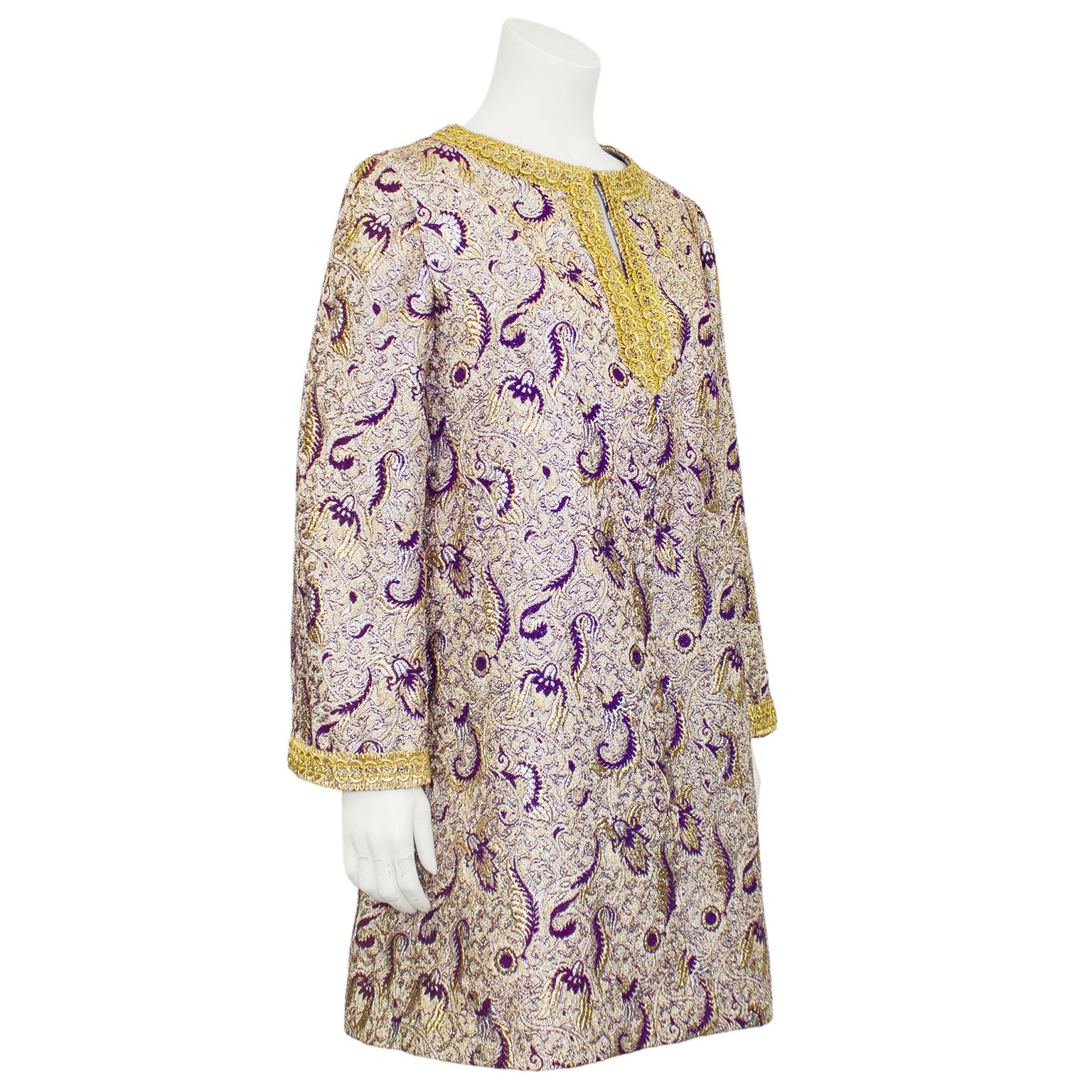 Ready for the holidays. Stunning purple and gold paisley pattern brocade tunic/mini dress. Wear this for any occasion from holiday party friends wedding. Wear as a mini or top over your choice of pants, leggings or fishnet stockings. In excellent