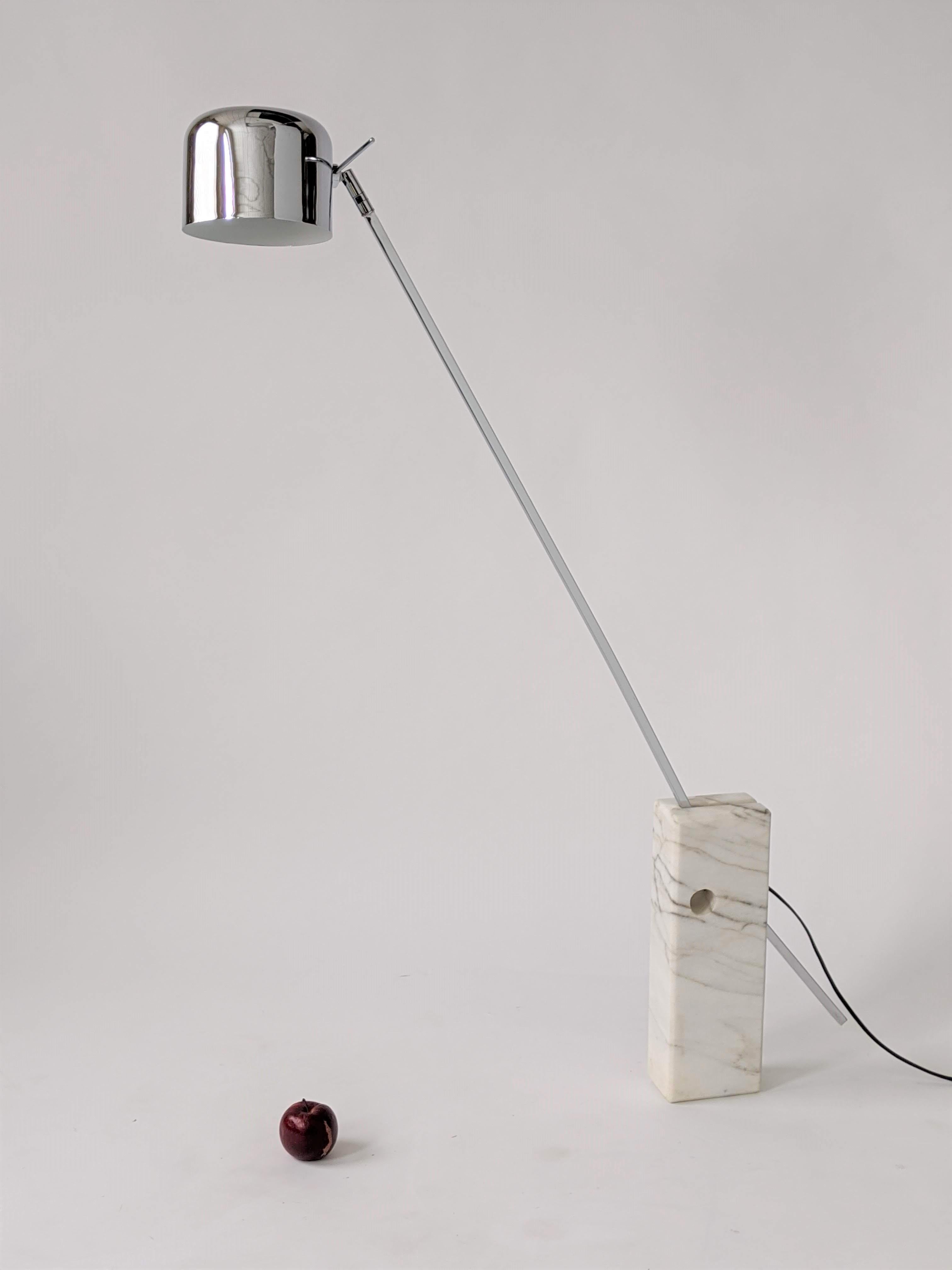 Small floor or huge table lamp with a bold modern Minimalist line. 

48 inches high chrome lamp on a marble base 

Contain one E26 size socket rated at 60 watt. 

Rewired. Foot switch on cord.