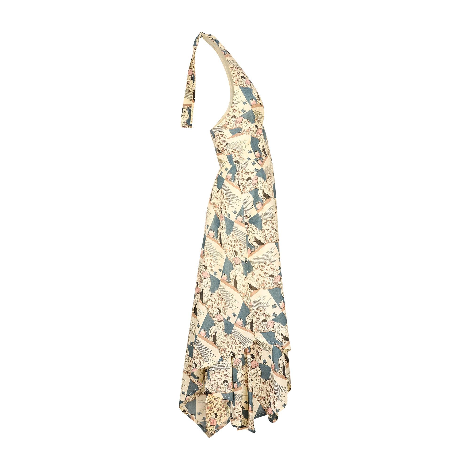Original 1970s cotton midi dress by British boutique label Jon Adam. The dress has a very desirable novelty scenic print showcasing a Japanese woman picking fruit from a tree surrounded by flying birds. The colour palette is lovely, showcasing slate