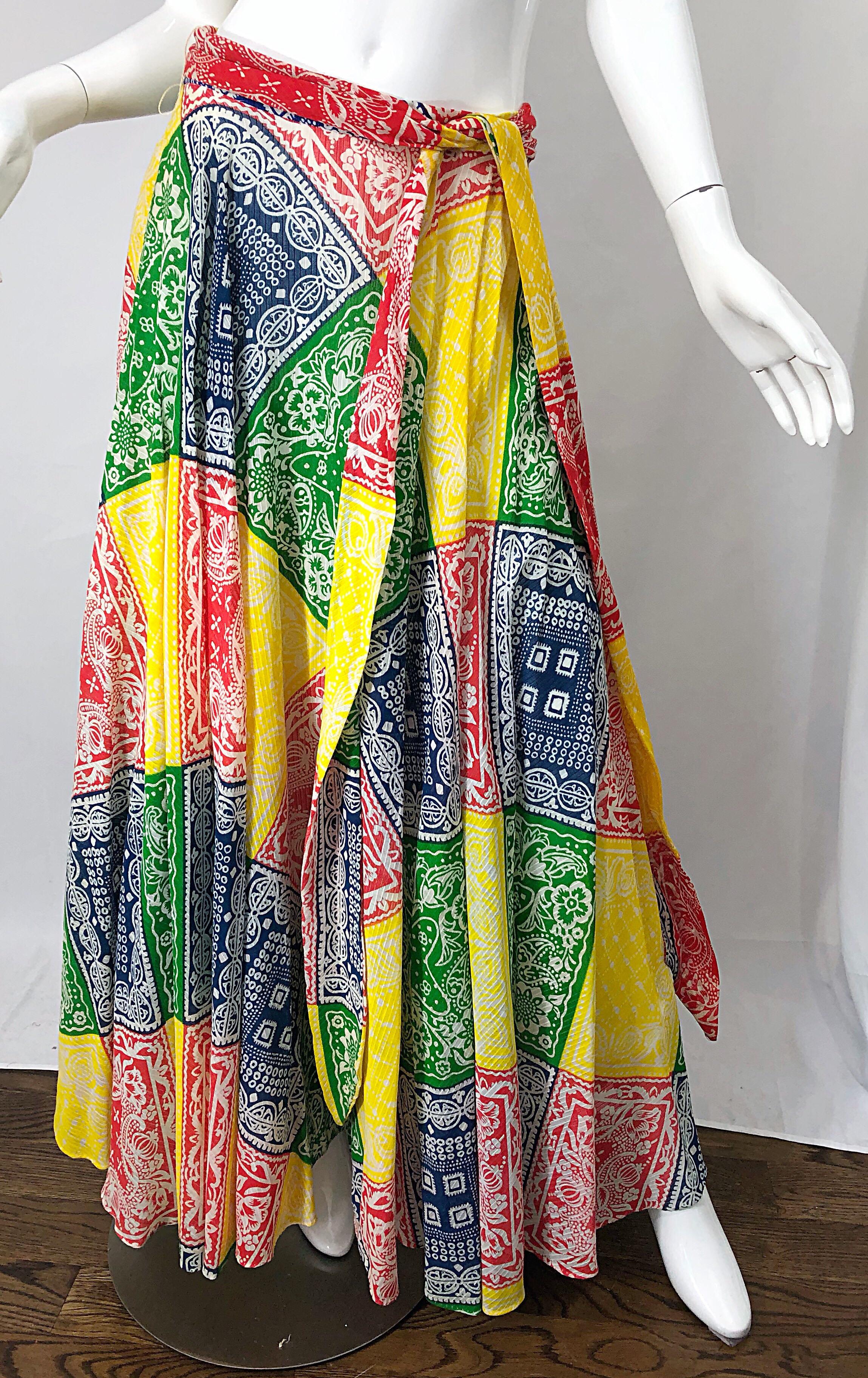 Boho chic! 1970s JOSEPH MAGNIN multicolor bandana print cotton maxi skirt and sash belt! Features vibrant colors of red, blue, green, yellow and white throughout. Hidden metal zipper up the side with hook-and-eye closure. Detachable sash waist belt.
