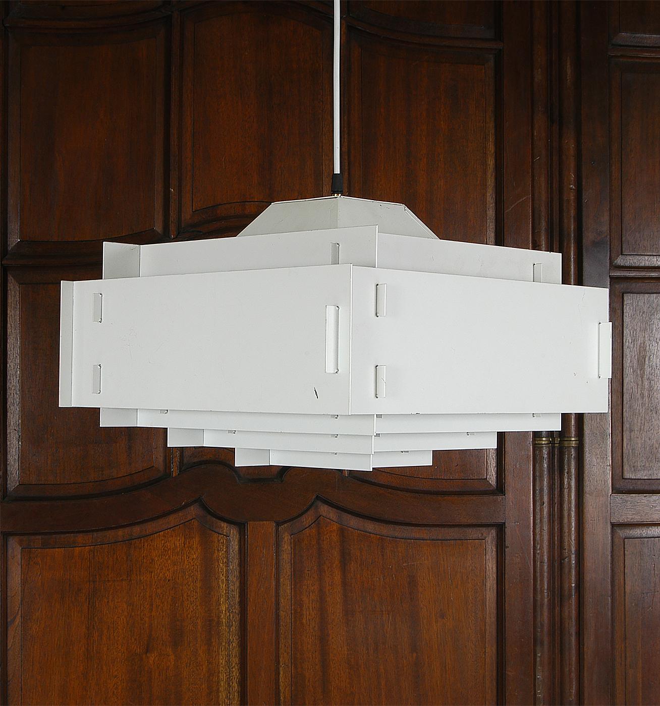 A good 1970s Danish ceiling 'Pyramid' lamp model 43818, designed by Jørgen Rasmussen & Ole Meyer and manufactured by Louis Poulsen. Consisting of five graduated square steel shades hung from a central canopy containing the bulb-holder. 
In good