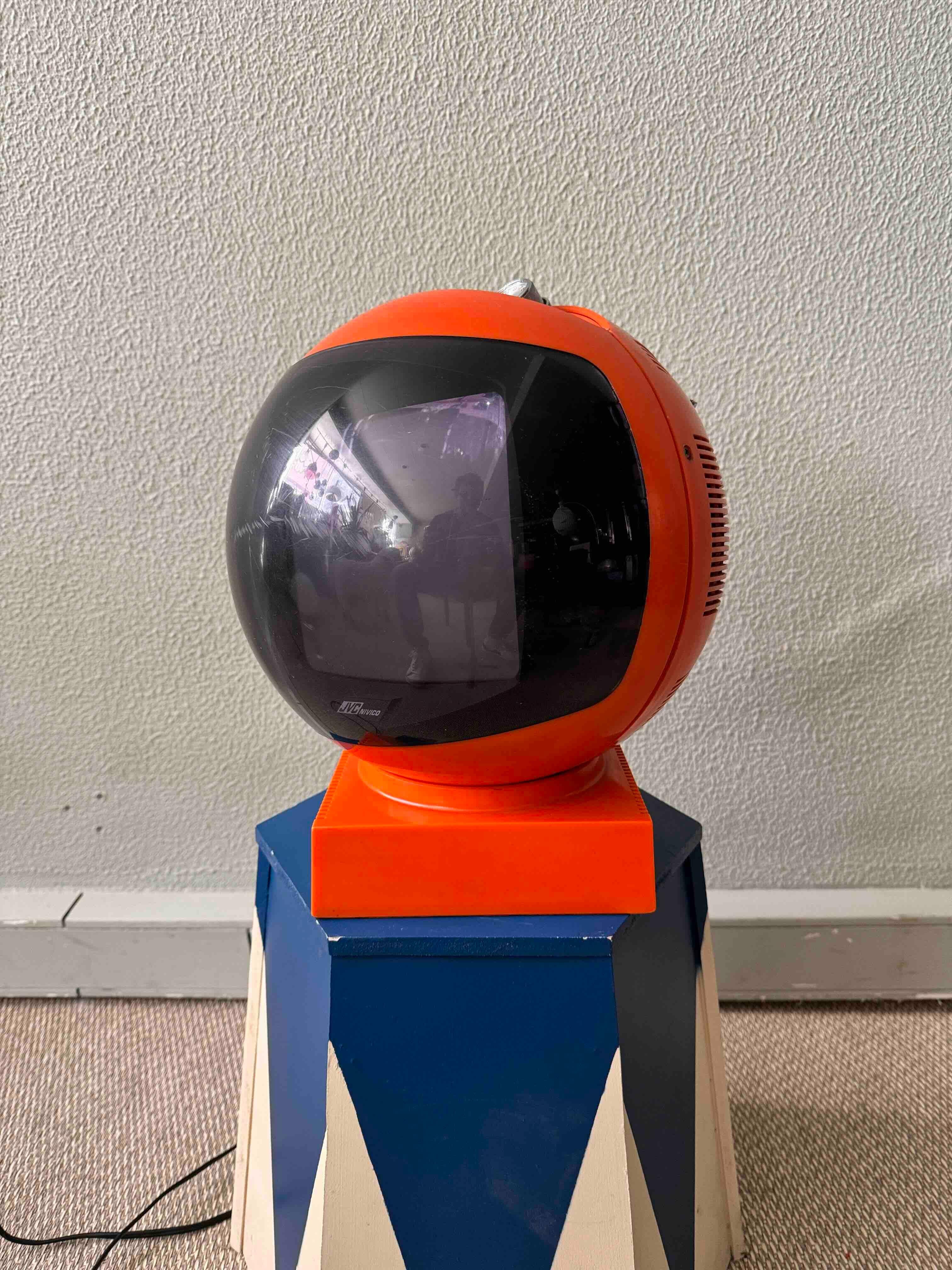
Introducing a rare gem from the 1970s—the JVC Videosphere Portable TV, produced in Japan. This iconic orange model, one of the rarest colors, encapsulates the futuristic and innovative design ethos of its era.

As described in an original