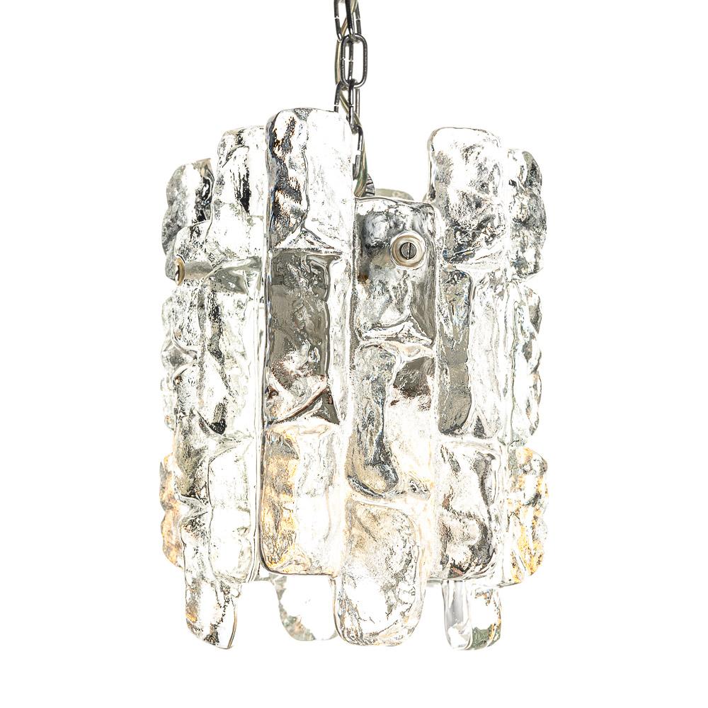 This is a stunning Kalmar ice glass crystal pendant from the 1970s. The glass looks like pure ice from a glacier and sparkles when illuminated.