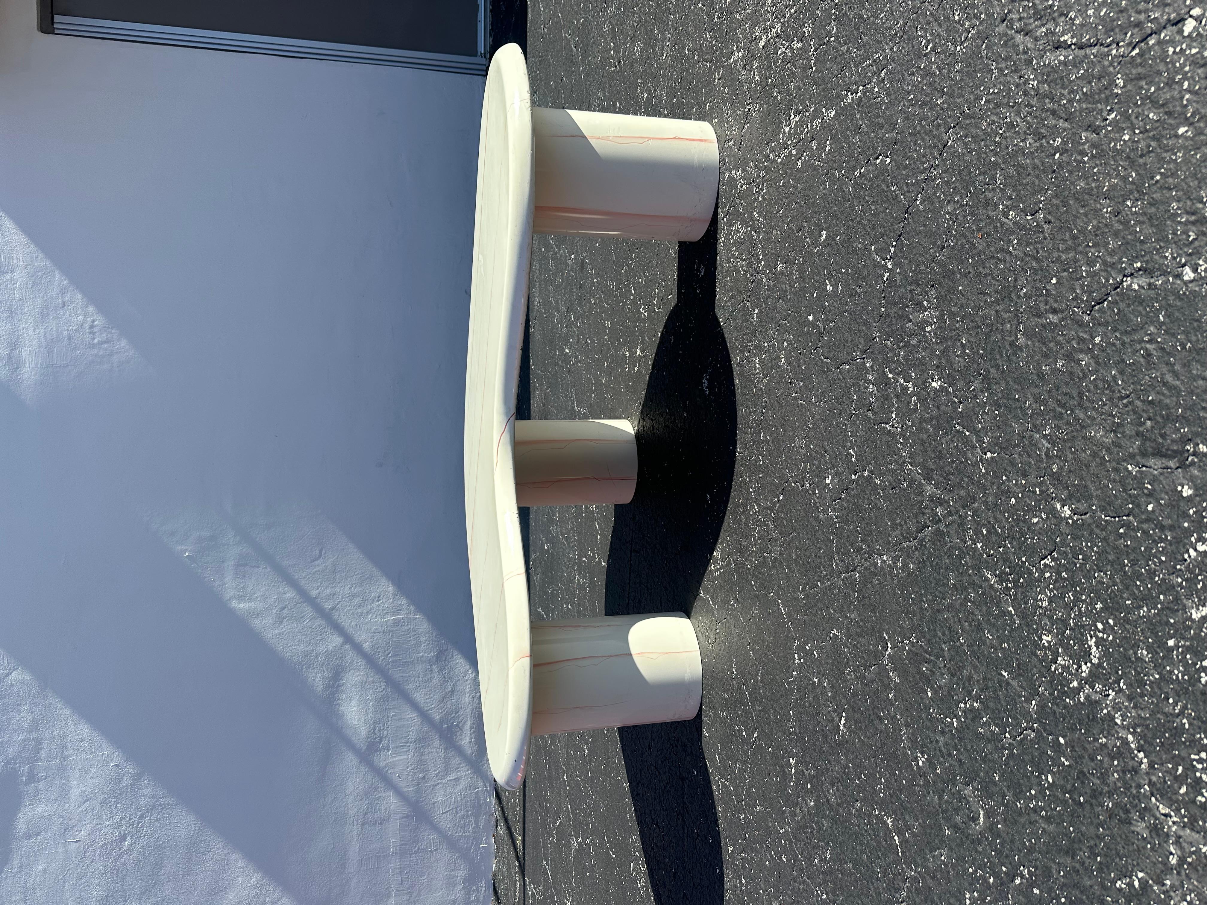 Transport yourself back to the sleek and sophisticated 1970s light beige plaster kidney coffee table. The distinctive craftsmanship frame that gives this piece a delightful mid century design, assuring a striking proportioned profile view from all