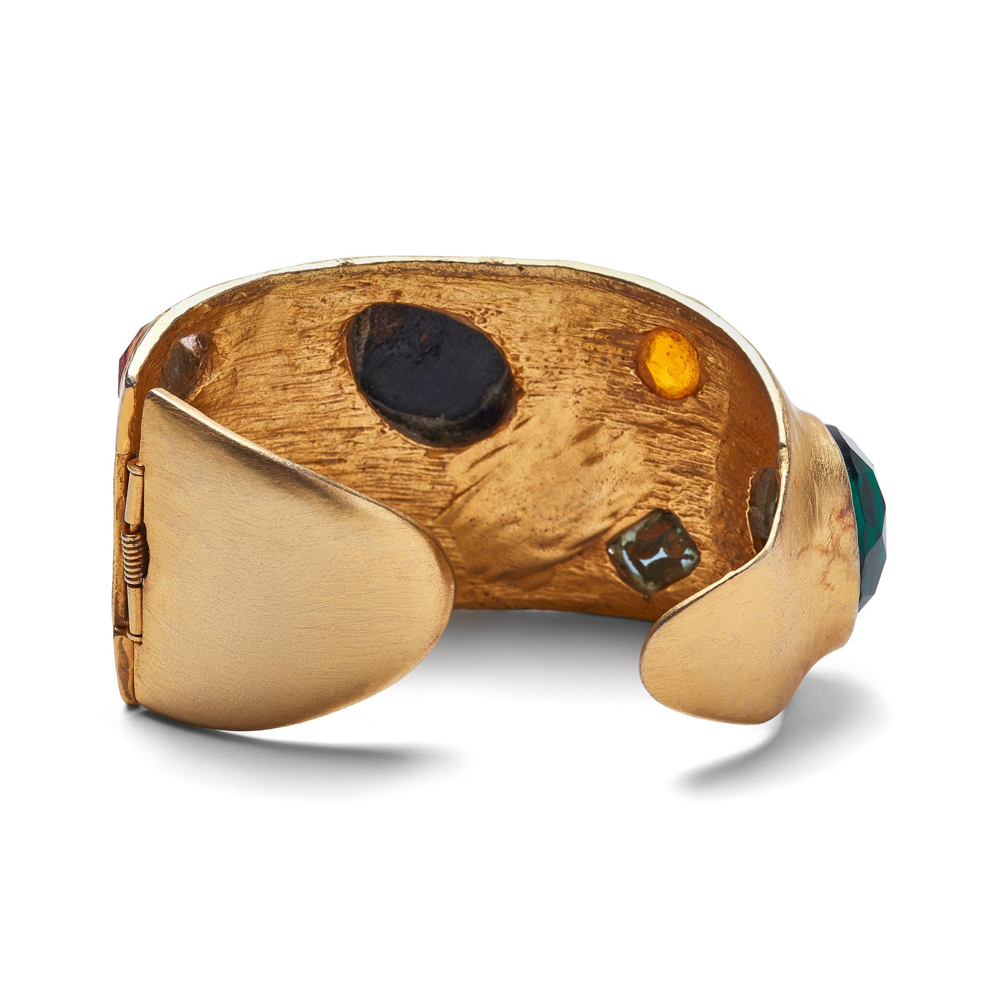 This showstopper of a cuff was designed by Kenneth Jay Lane in the 1970s. Kenneth Jay Lane, who began designing jewellery in 1963, was famously compared to Coco Chanel on a number of occasions for his popularisation of high quality costume