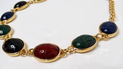 1970s Kenneth Jay Lane Multicolor Carved Scarab Gold Tone Necklace