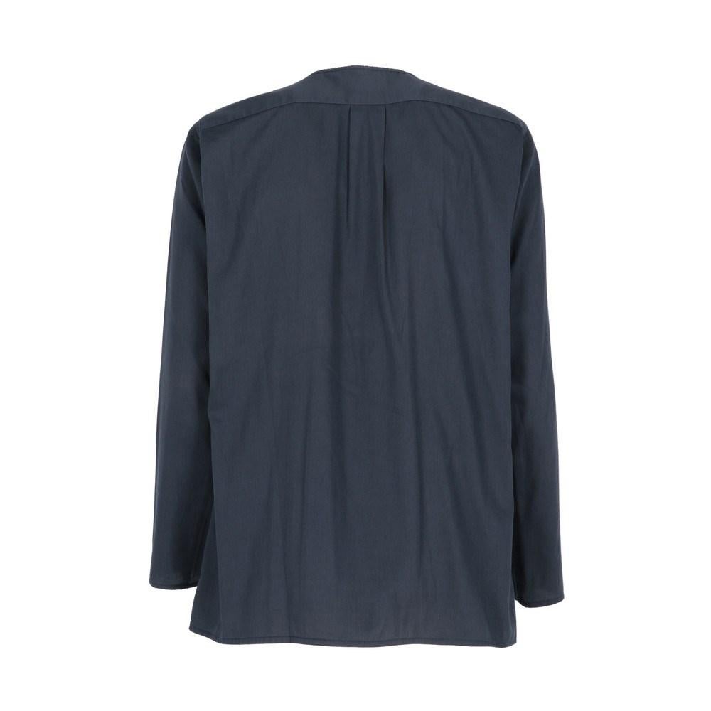 Kenzo Jap dark blue cotton blouse. Crew-neck, long sleeves and three buttons front closure. Back pleats.

Size: 38 FR

Flat measurements
Height: 67 cm
Bust: 49 cm
Shoulders: 41 cm
Sleeves: 53 cm

Product code: X0613

Composition: 100% Cotton

Made