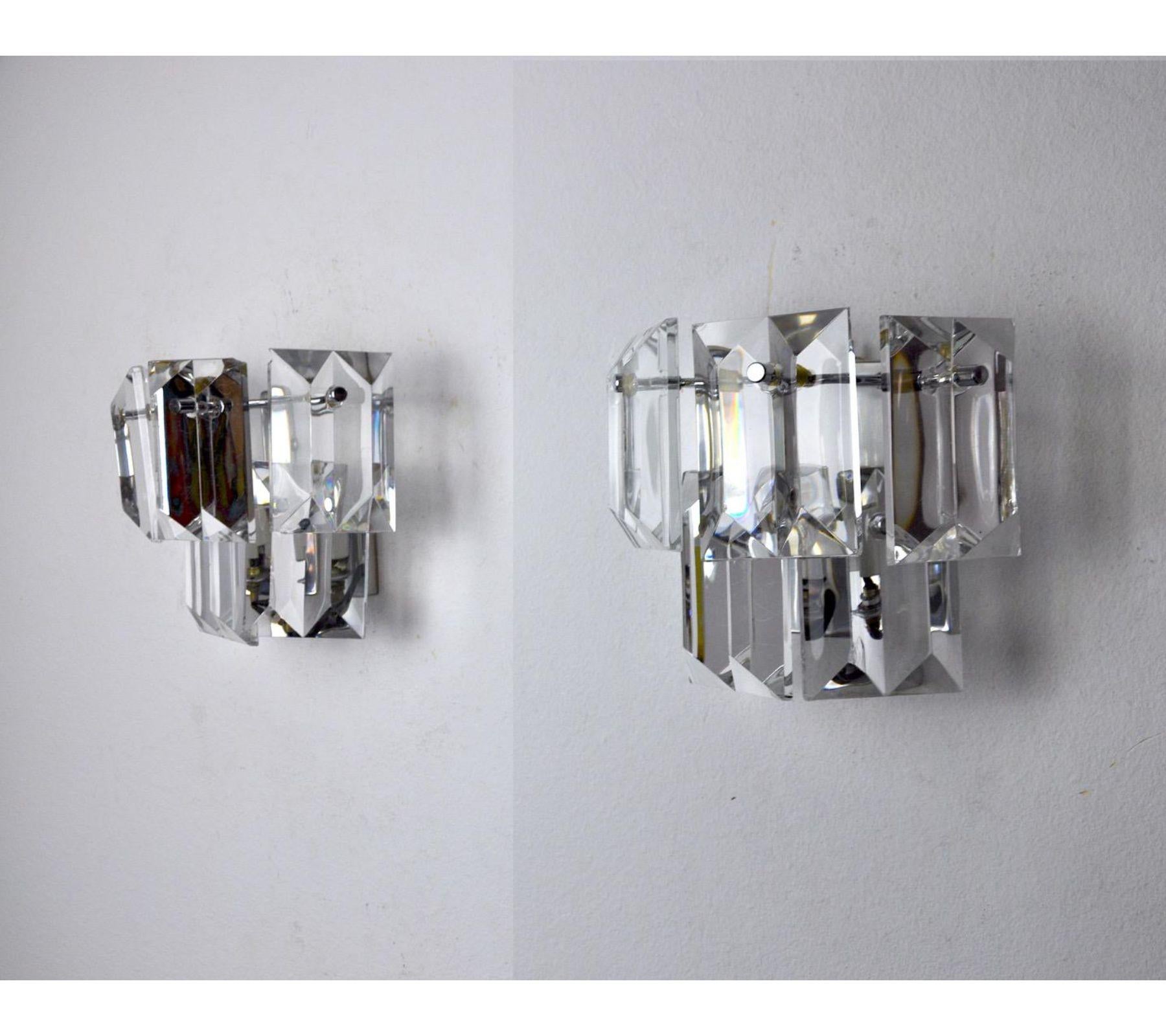 Very nice pair of kinkeldey wall lamps designated and produced in germany in the 1970s. Very beautiful design object that will illuminate your interior wonderfully. Electricity verified, time marks in accordance with the age of the object. 
Sconce: