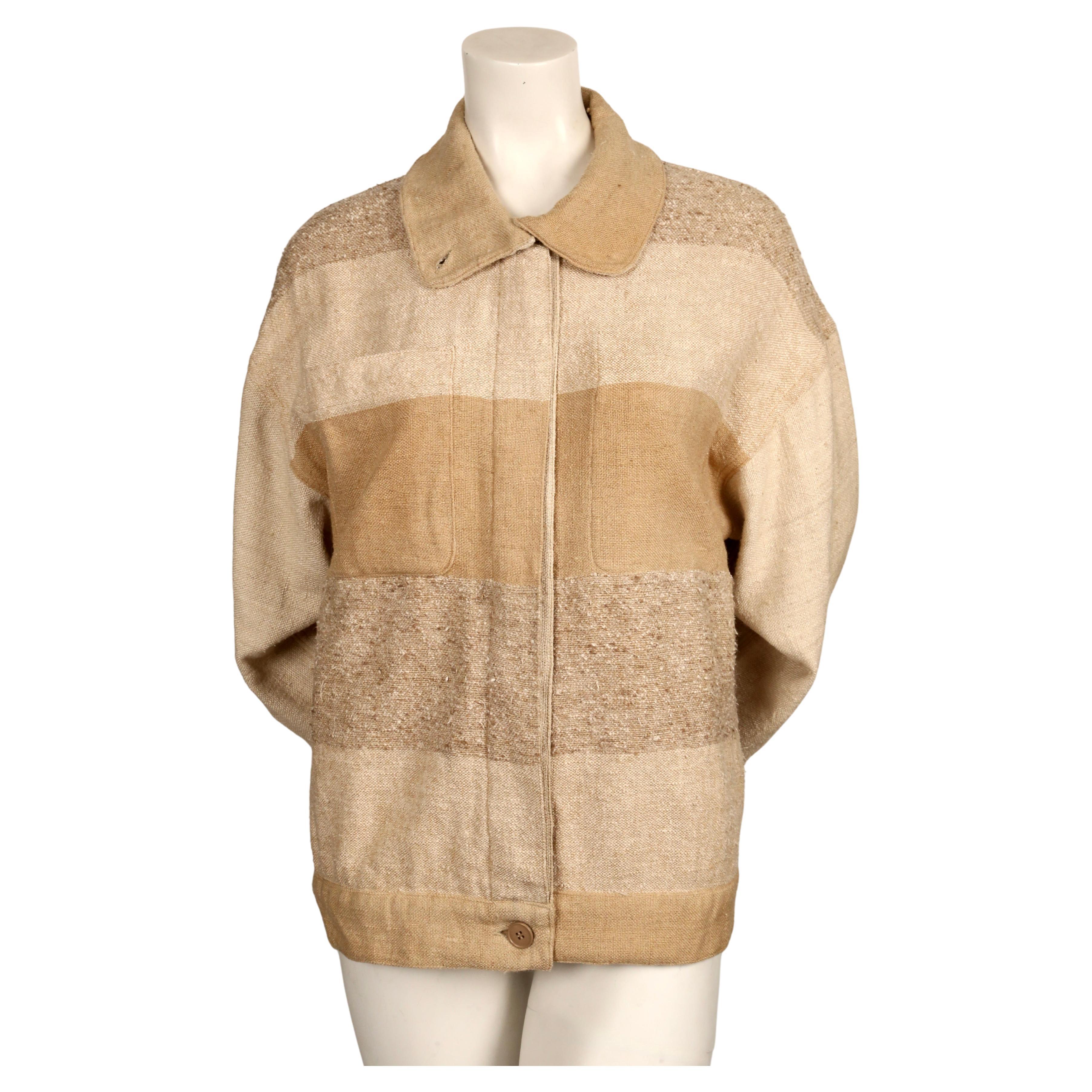 Very rare, earth-toned, raw silk jacket with stripes designed by Jean Charles de Castelbajac for KO and CO dating to the 1970's. No size indicated however this best fits an XS to a size M. Approximate measurements: drop shoulder 23