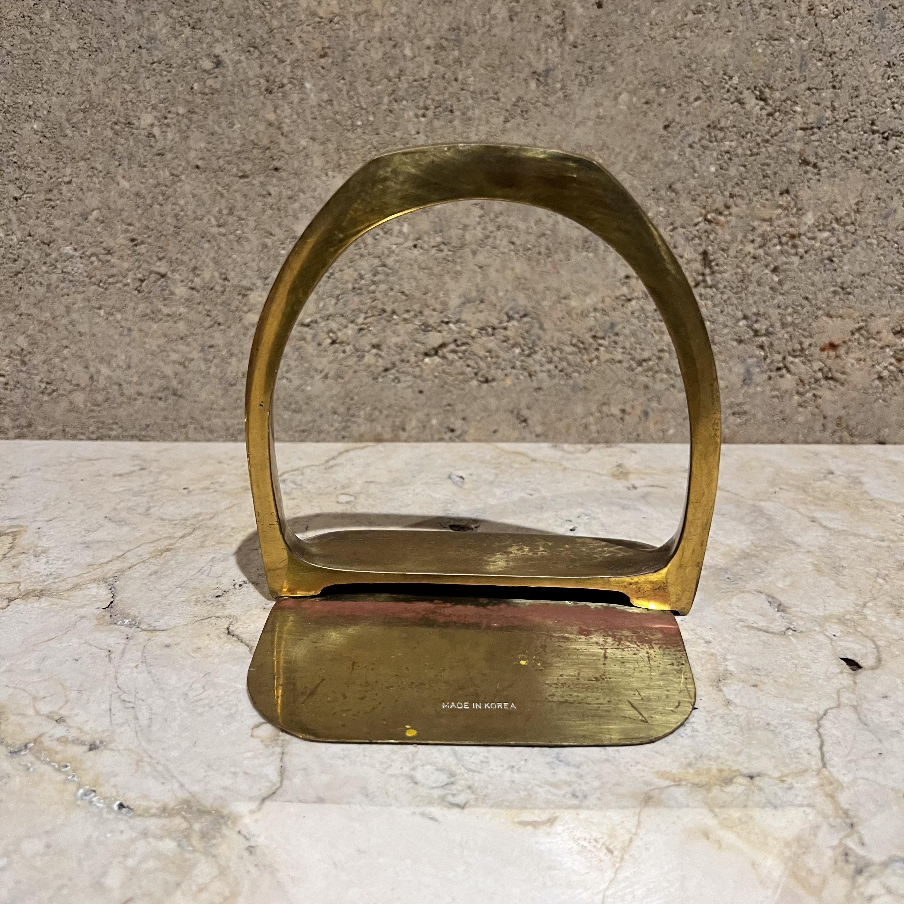AMBIANIC presents
Single Korean Brass Bookend Sculptural Equestrian Stirrup
5 h x 4.75 w x 3.25
Original vintage condition
Refer to images