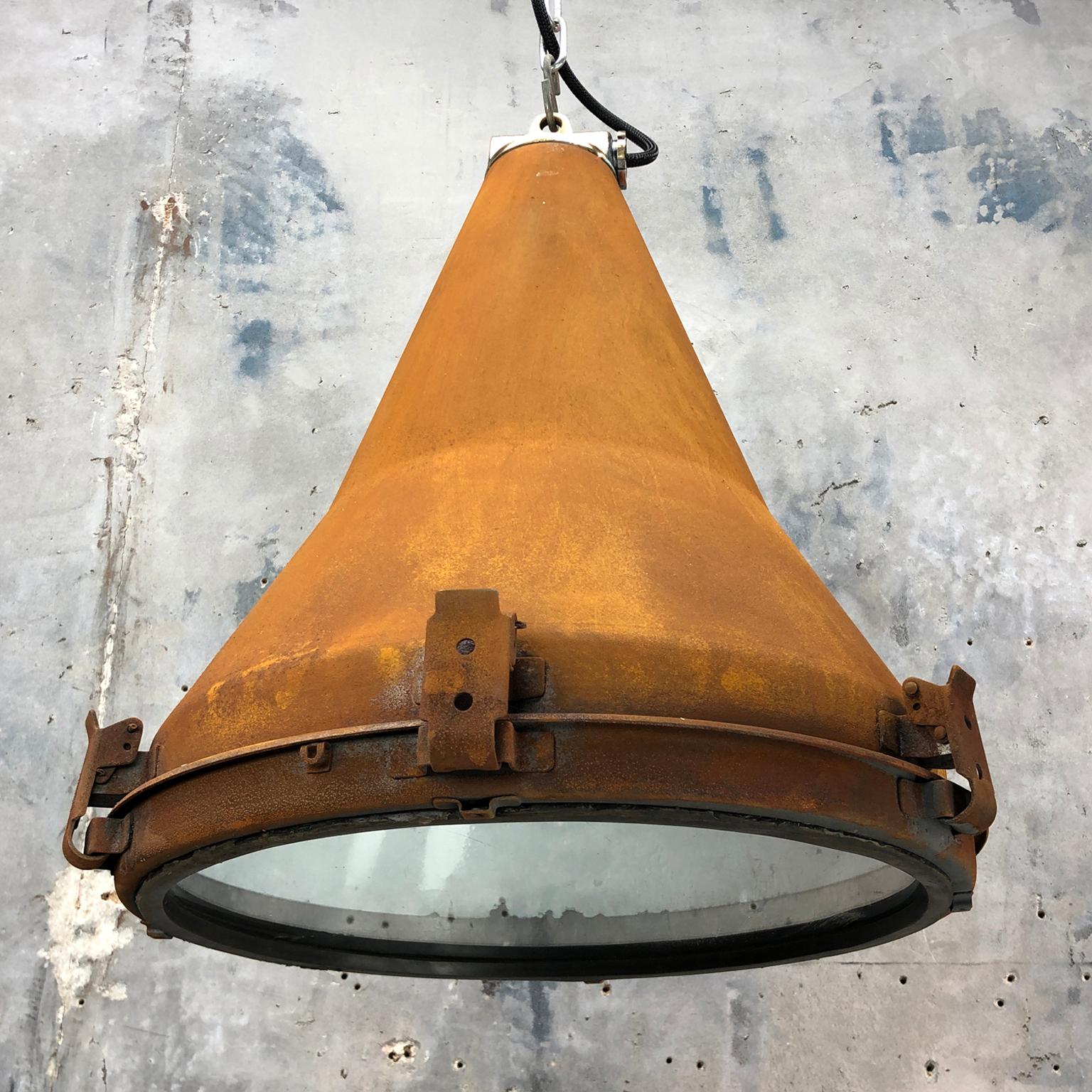 A vintage industrial steel conical ceiling pendant light with applied rust finishing by Korean manufacturer Daeyang. Reclaimed from decommissioned cargo ships, circa 1970. Originally used on masts and gantries to flood light the container