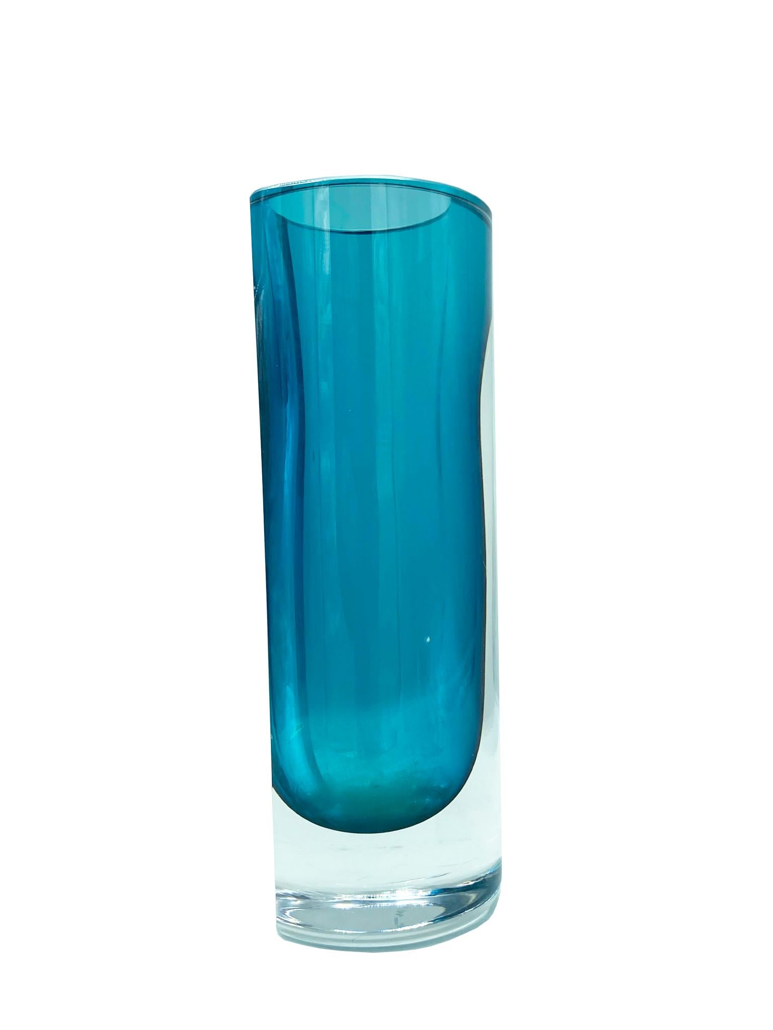 Swedish vase in vibrant blue submerged glass signed Kosta from the 1970s.