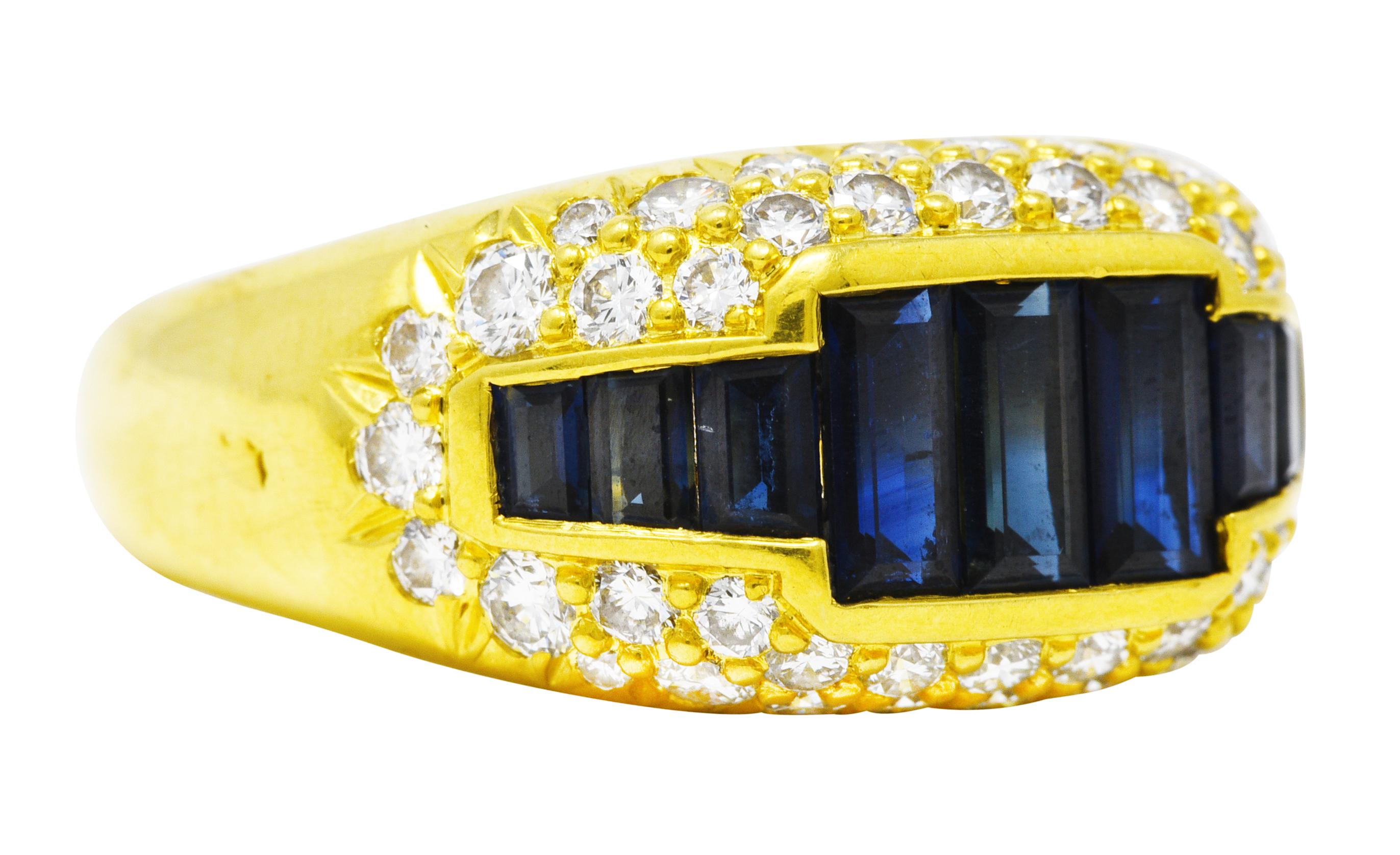 Bombè band ring centers a central channel of rectangular cut sapphires. Graduating in size while weighing in total approximately 1.50 carats. Very well matched in saturated royal blue color. Surrounded by pavé set round brilliant cut diamonds.