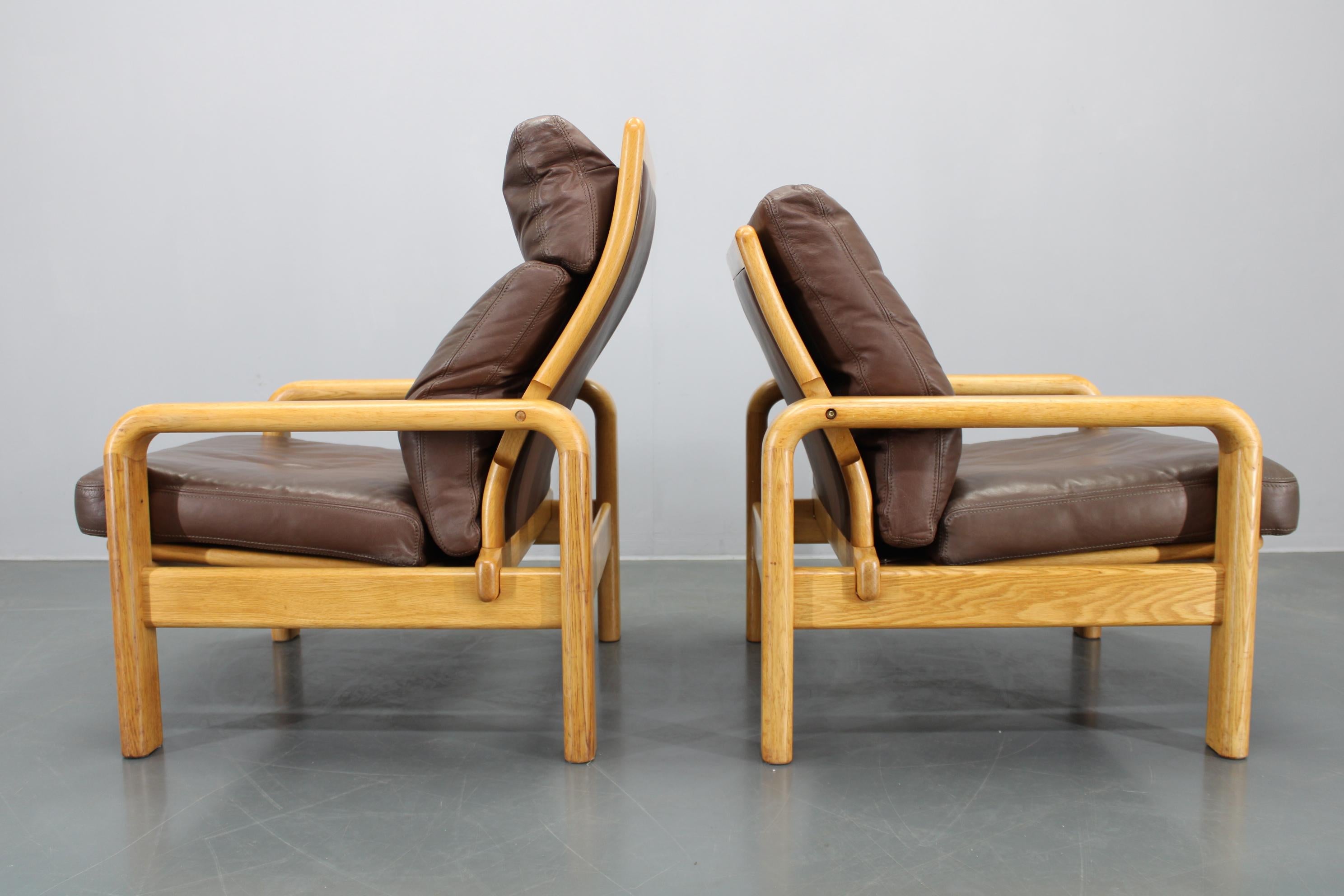 Danish 1970s L. Olsen & Søn Pair of Armchairs in Oak and Leather, Denmark For Sale