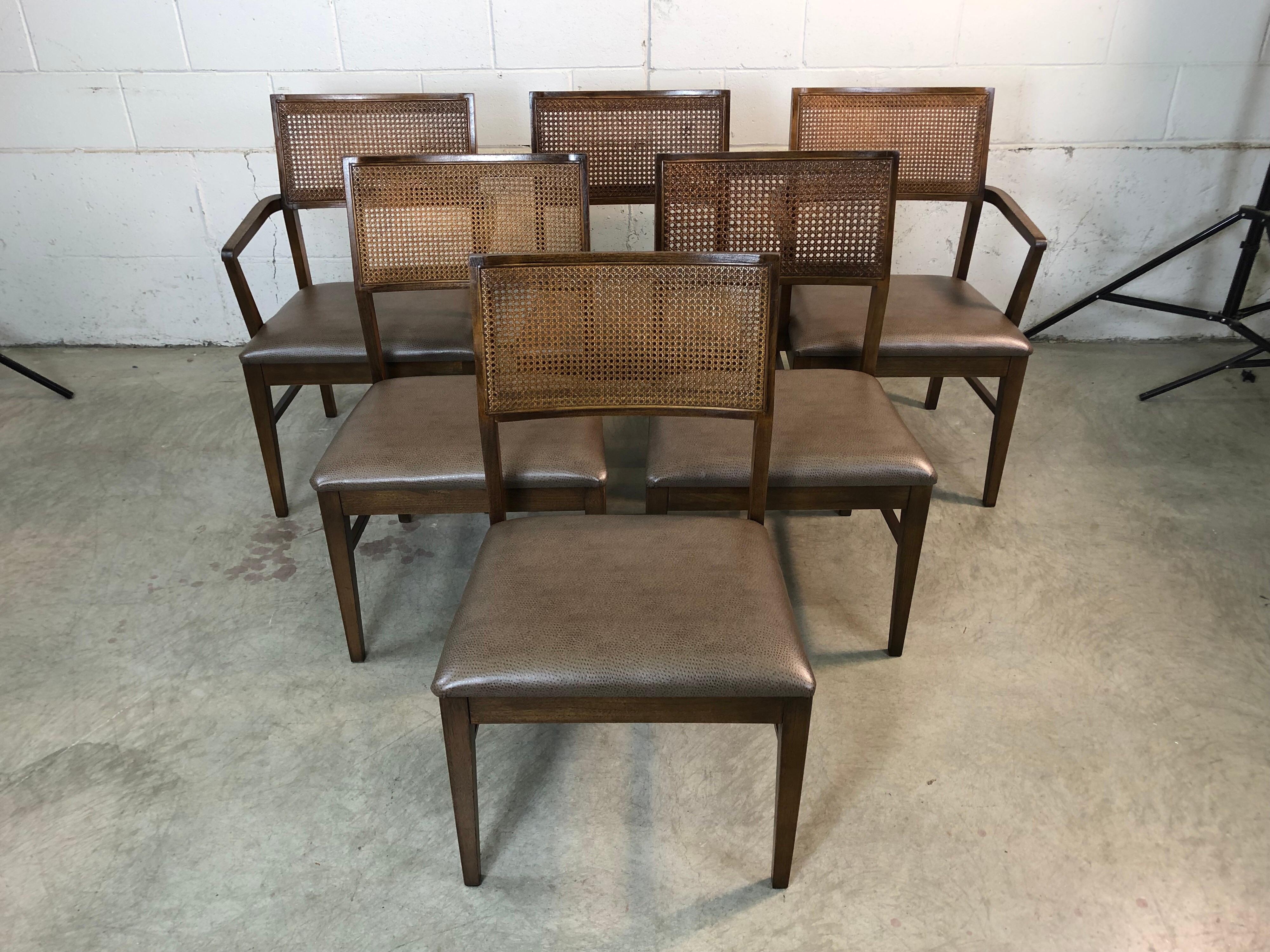 Mid-Century Modern 1970s Lane Furniture set of 6 dining room chairs in ashwood and with caned back seats. The set has two captain chairs. The chairs have all been fully restored and refinished. They also have new grey/brown textured vinyl seats.