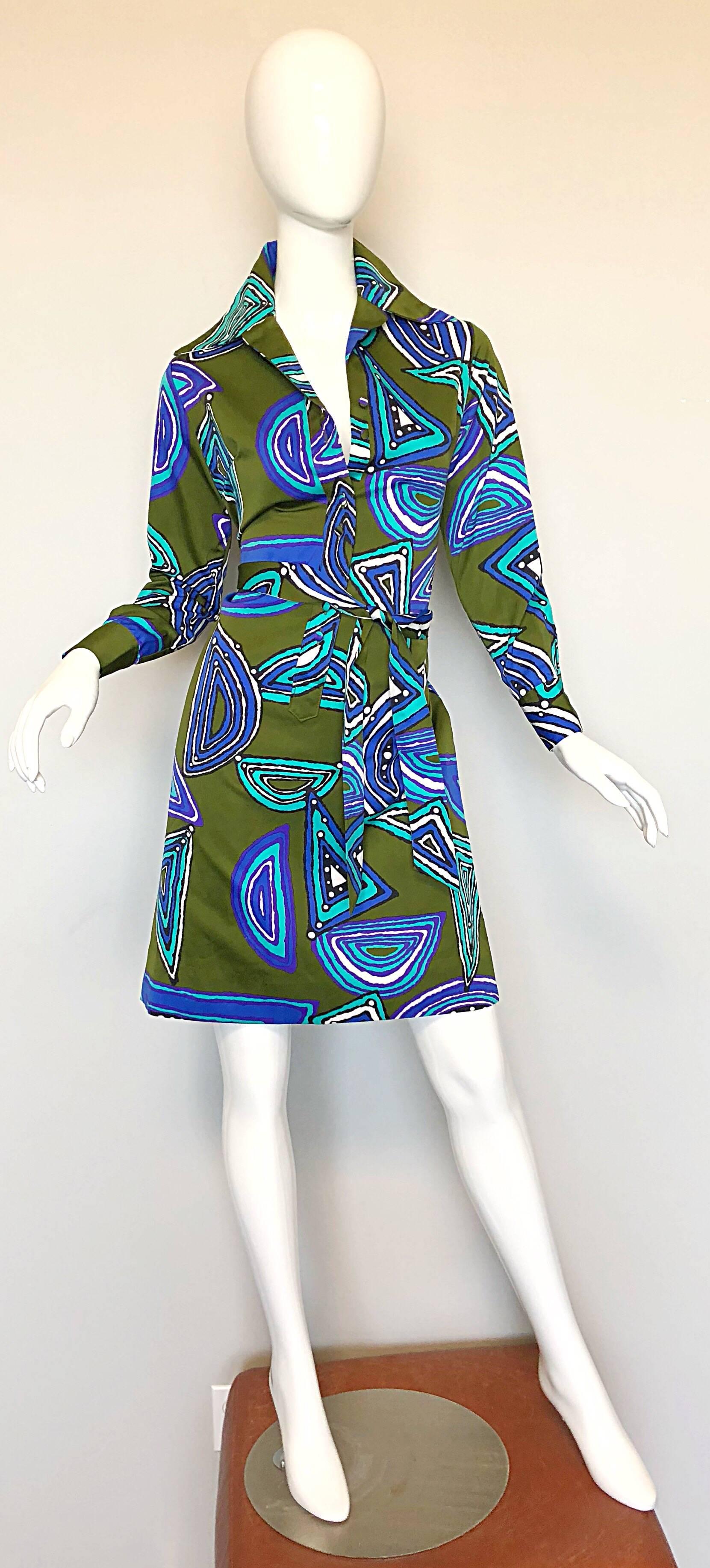 Chic vintage JEANNE LANVIN 1970s olive green and blue long sleeve belted shirt dress! Features an olive green background with abstract prints in vibrant hues of blue, turquoise teal and white. Fabric covered buttons up the front, and at each sleeve