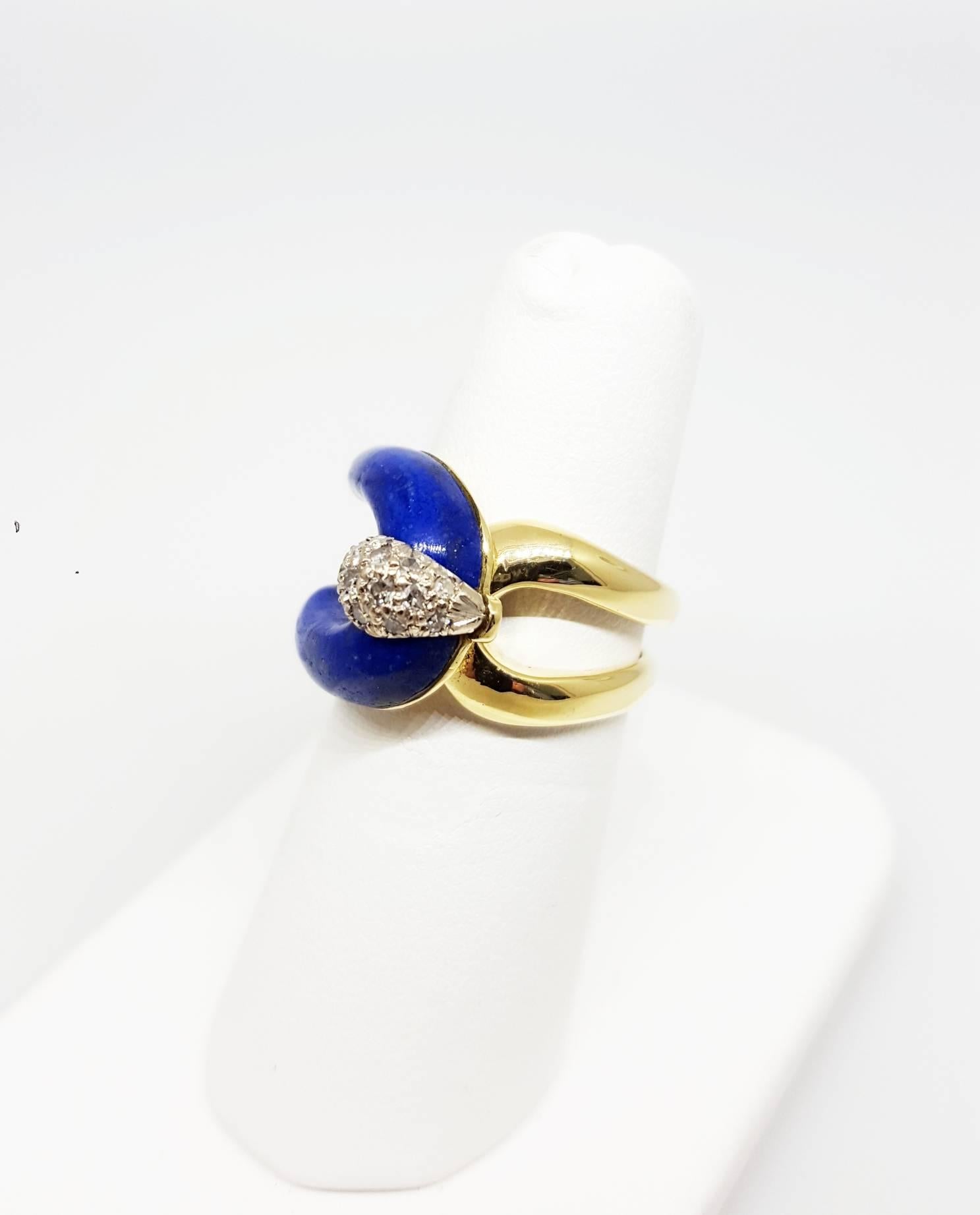 A 14 karat yellow gold ring inlaid with lapis and bead set with round step cut diamonds. There are a total of 15 diamonds that weigh approximately 0.25cttw. The ring is a size 5.5 and can be resized.

A ring like this is hard to find! It is a great