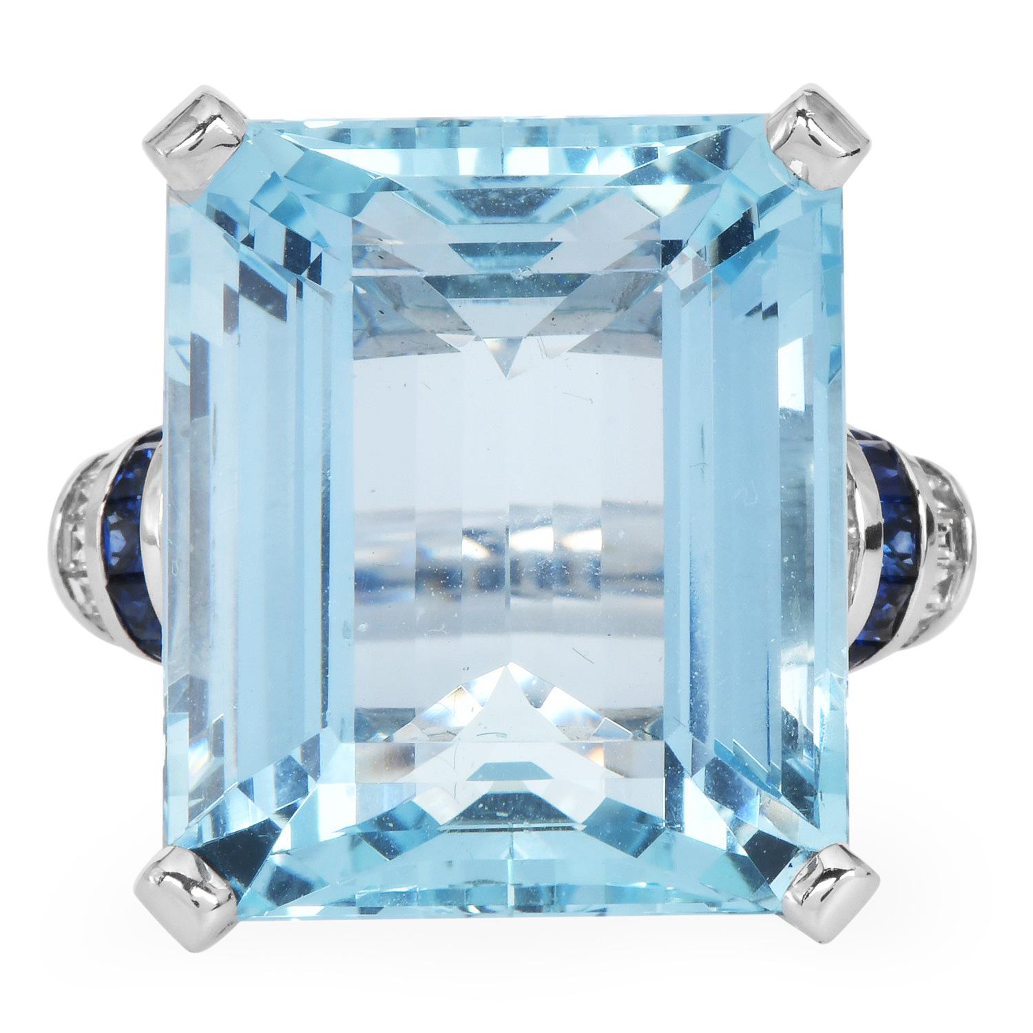 Estate 43.32ct Aquamarine Sapphire Diamond 18K White Gold Cocktail Ring

This exquisite Estate Cocktail Ring is centered by an impressive 41.55 carats step-cut aquamarine gemstone, radiating a serene, captivating blue. Set in luxurious 18K white
